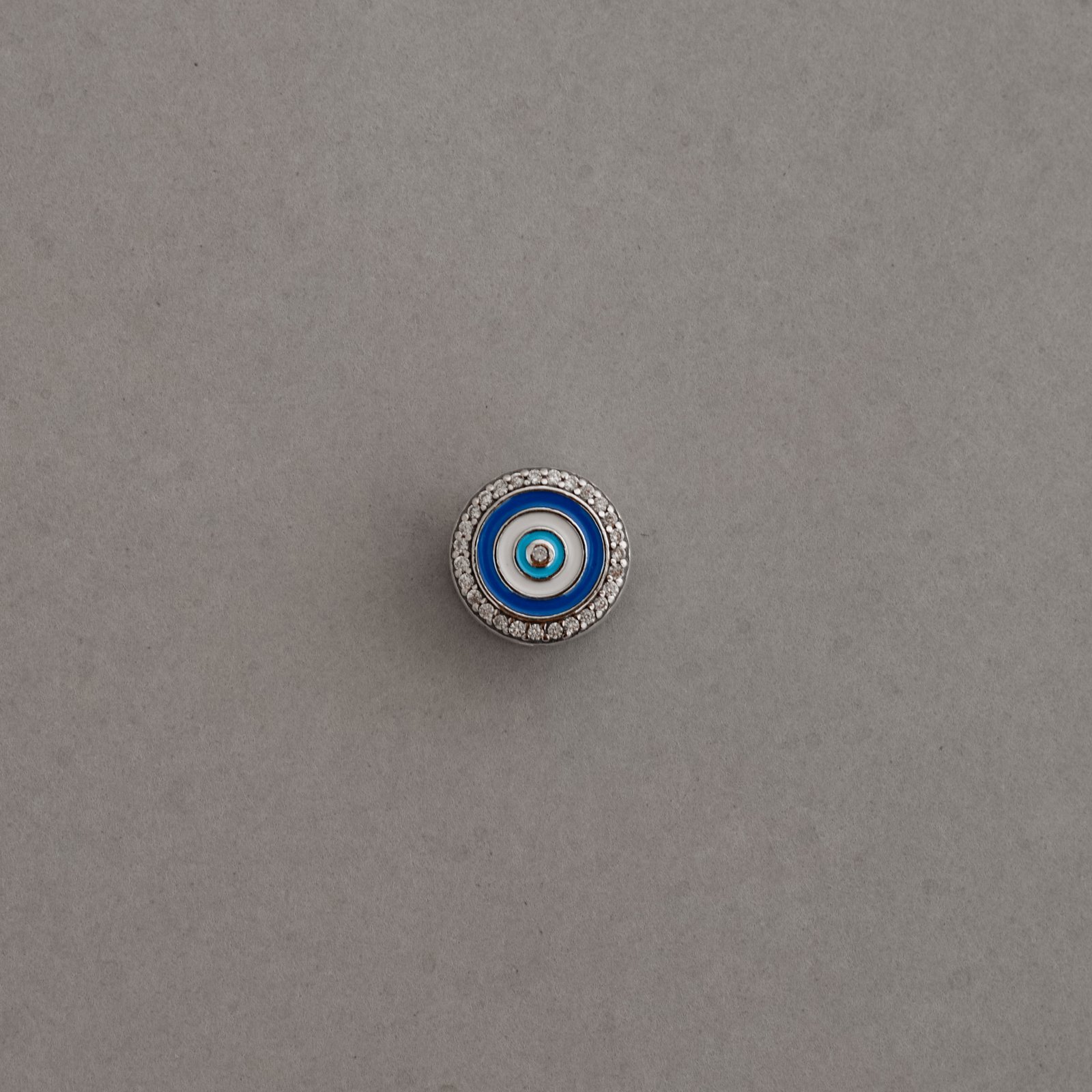 Berloque separador olho com cravejado e resina 11mm