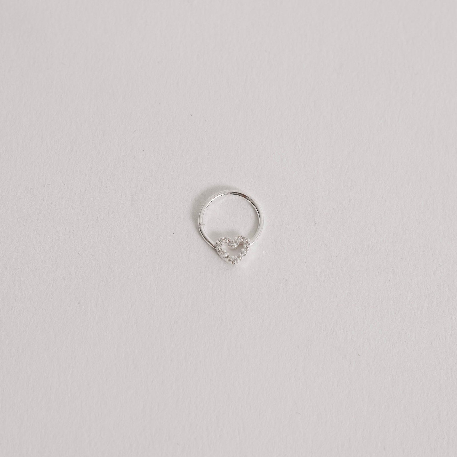 Piercing argola com coração vazado cravejado 11mm
