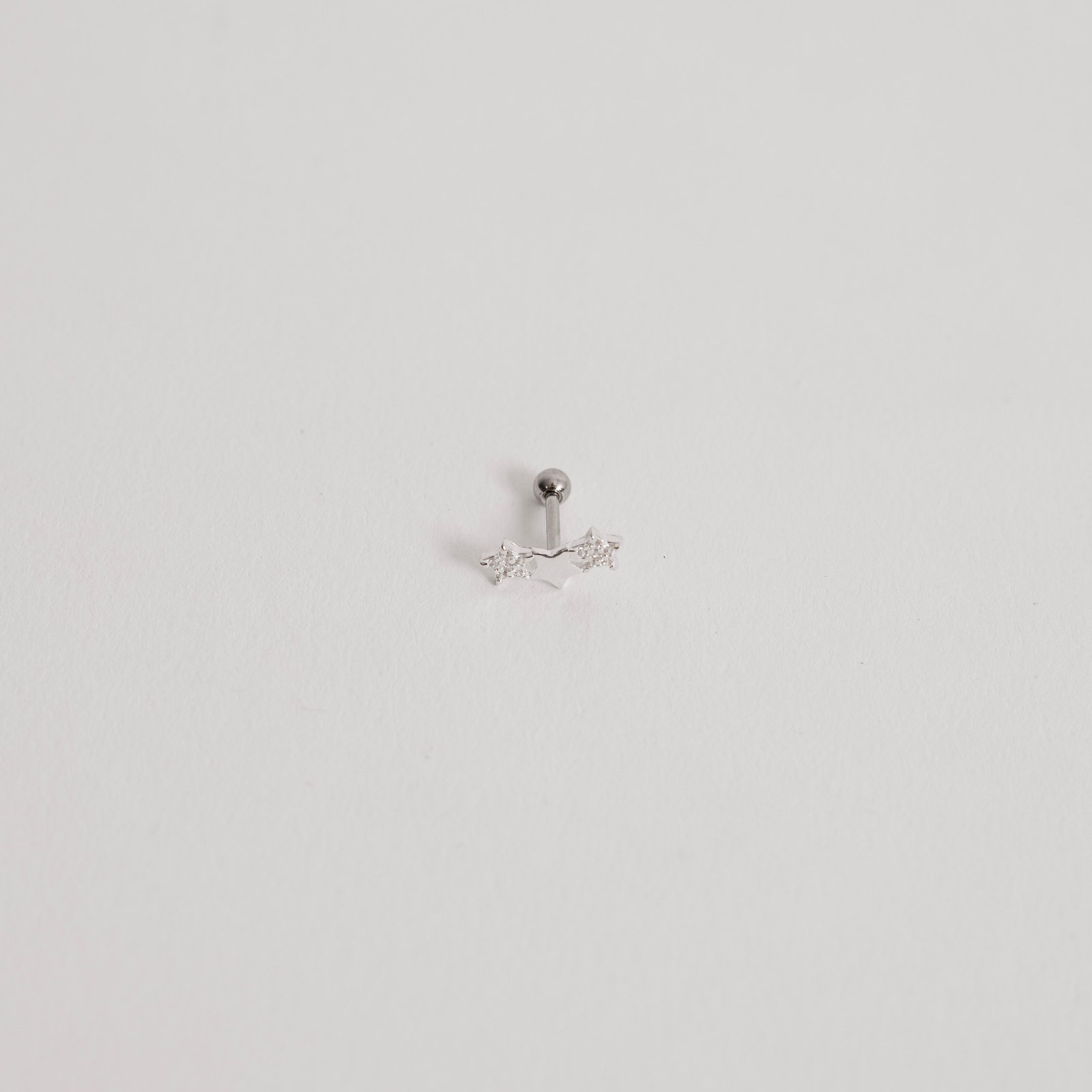 Piercing haste estrelas lisa e cravejada 11mm