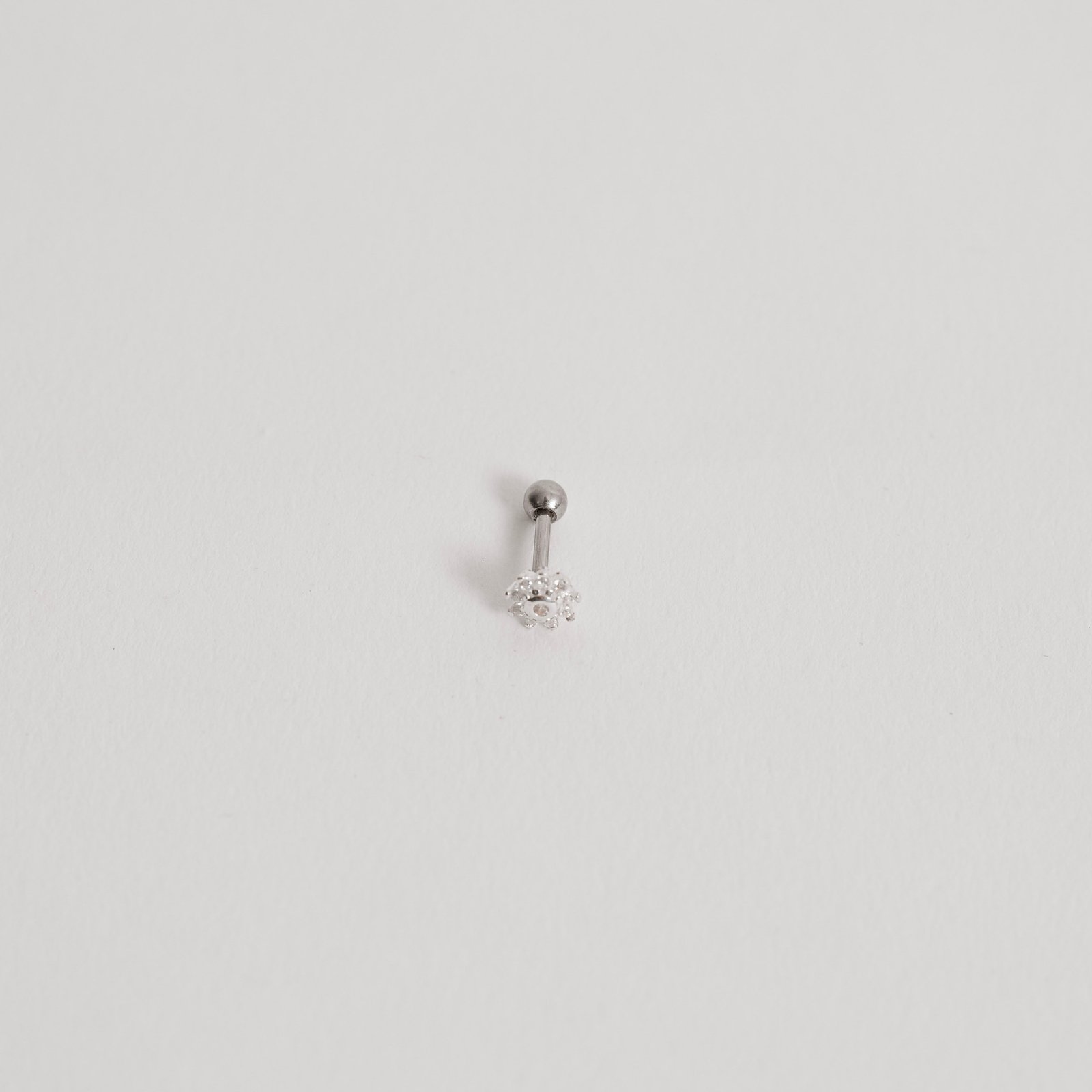 Piercing haste sol cravejado 6mm