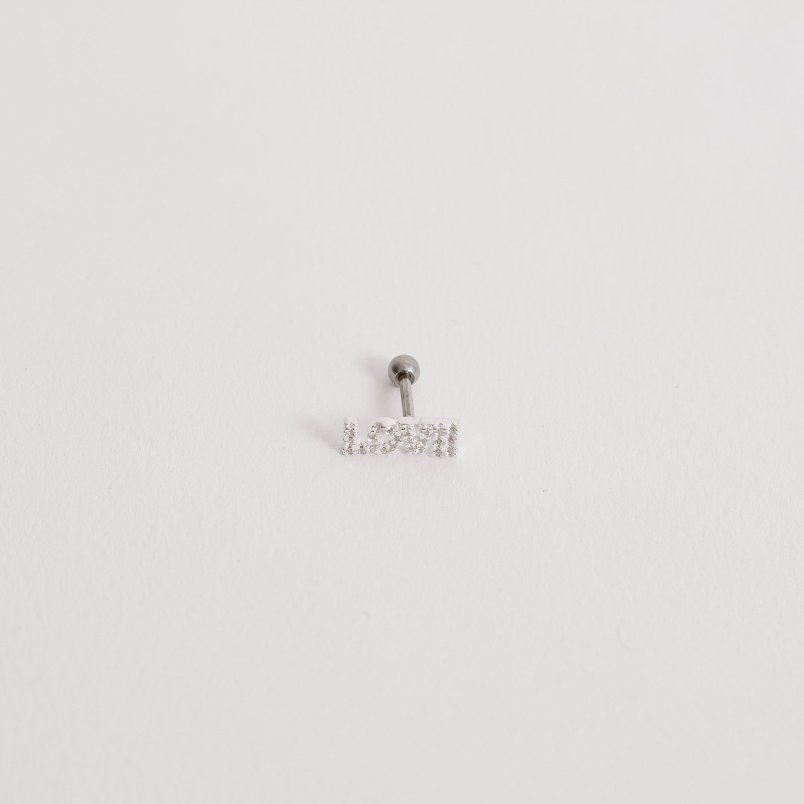 Piercing haste escrito love cravejado 10mm