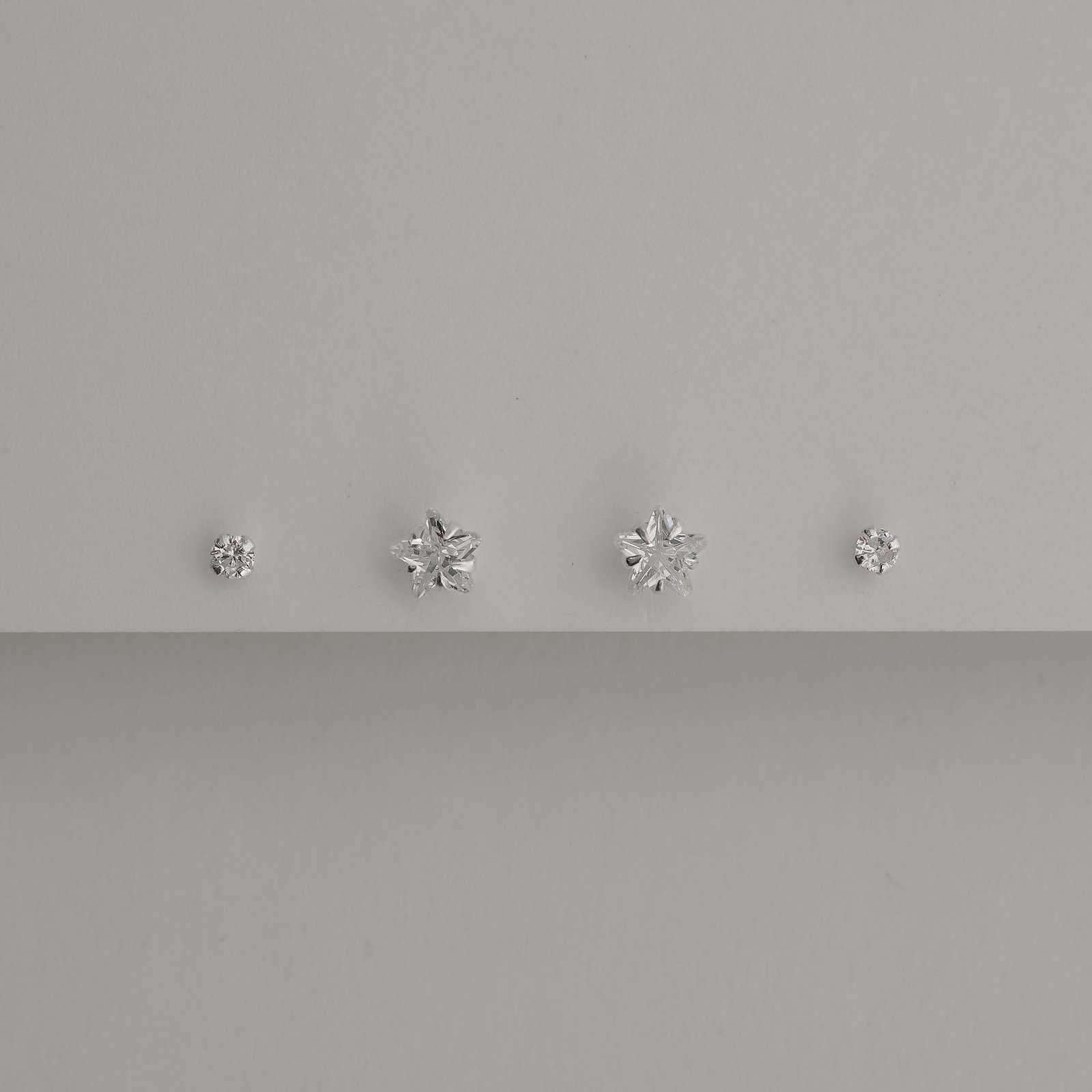 Dupla zircônias redonda 3mm e estrela 6mm