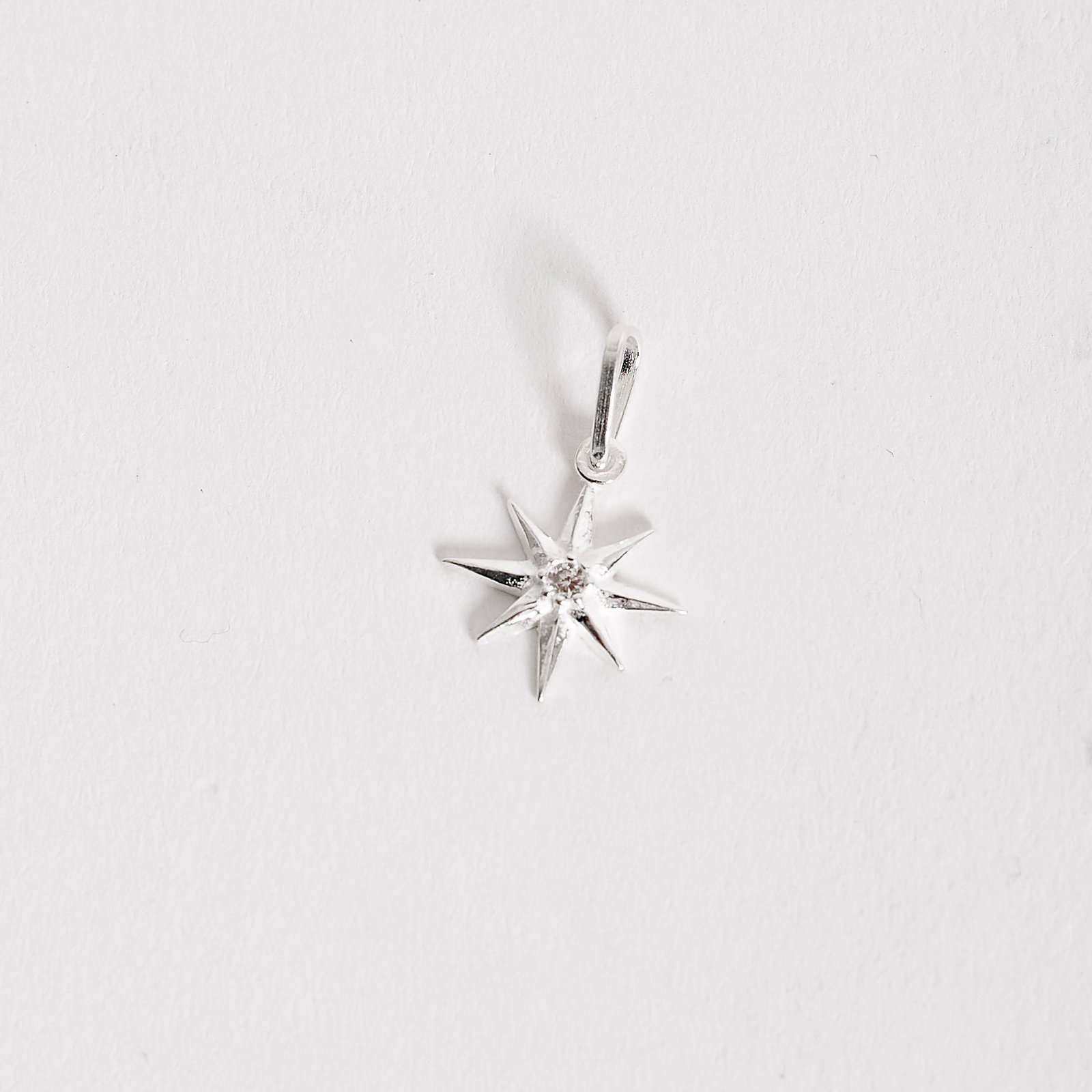 Pingente estrela 8 pontas 13mm