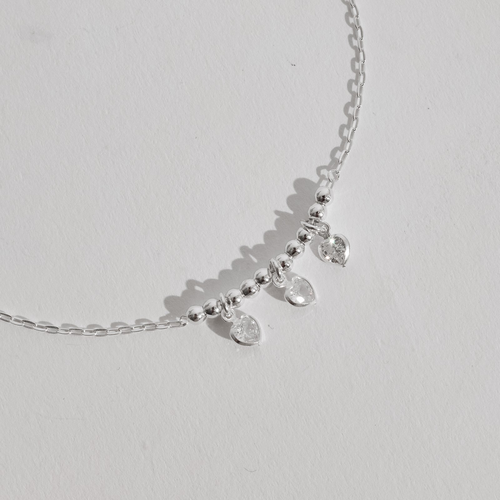 Pulseira entremeio bolas 3mm pingentes zircônia coração