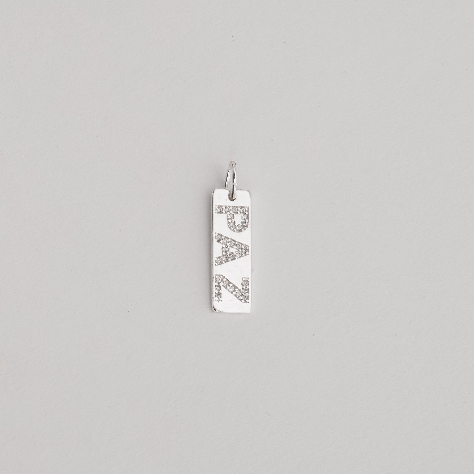 Pingente placa paz cravejada 22mm