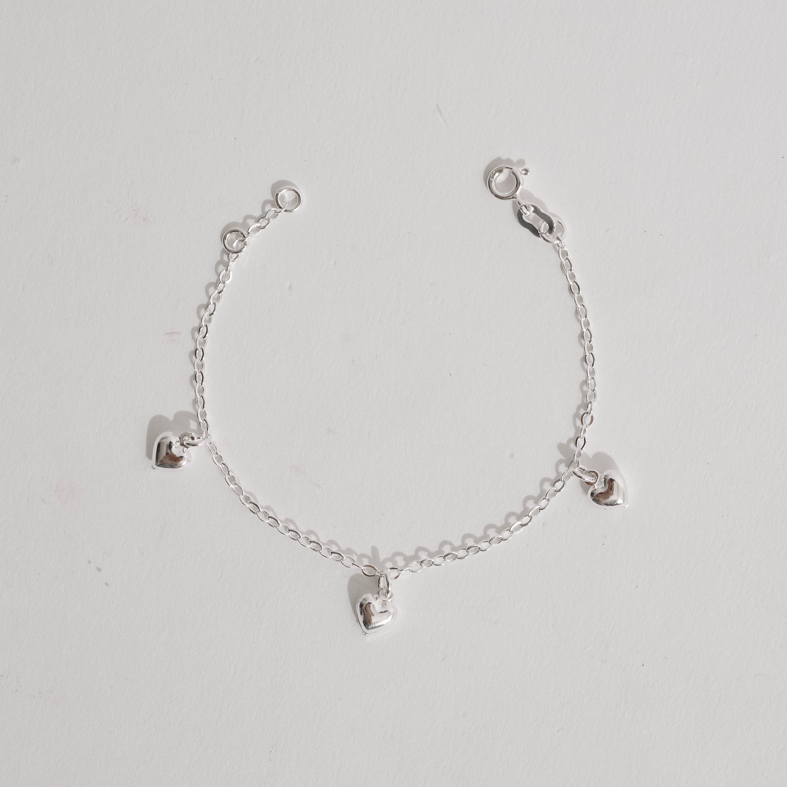 Pulseira pingentes corações 6mm 19cm