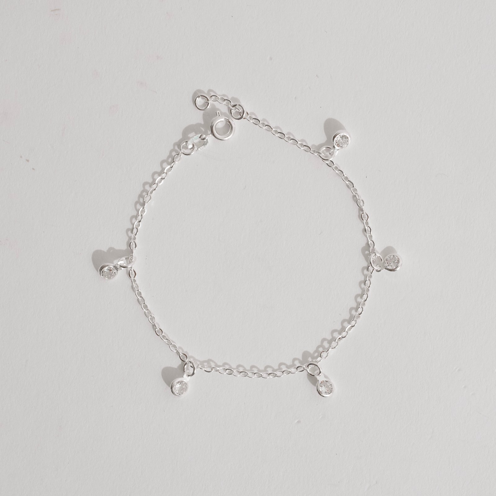 Pulseira pingentes zircônias 4mm 19cm