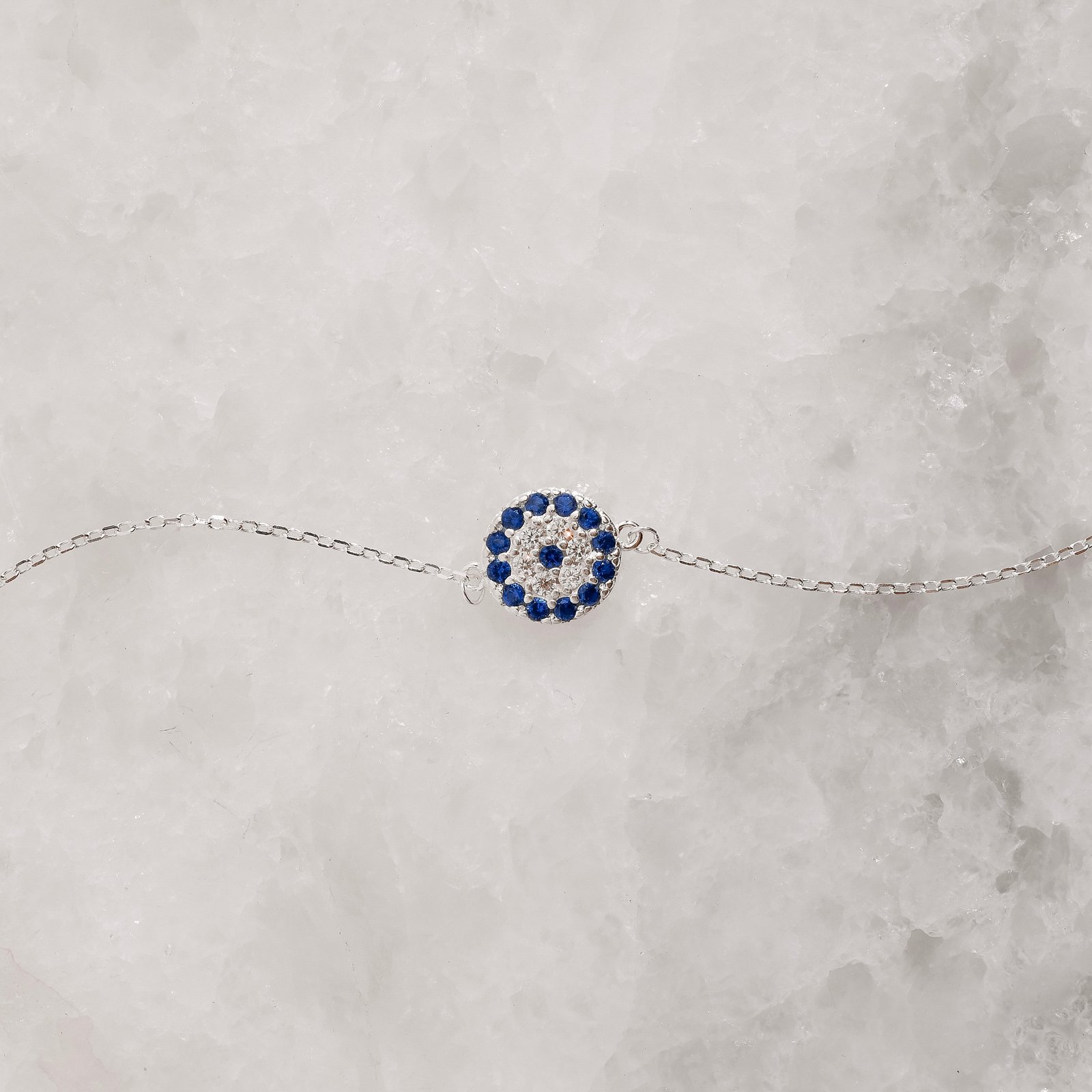 Pulseira entremeio círculo cravejado cristal e azul 10mm