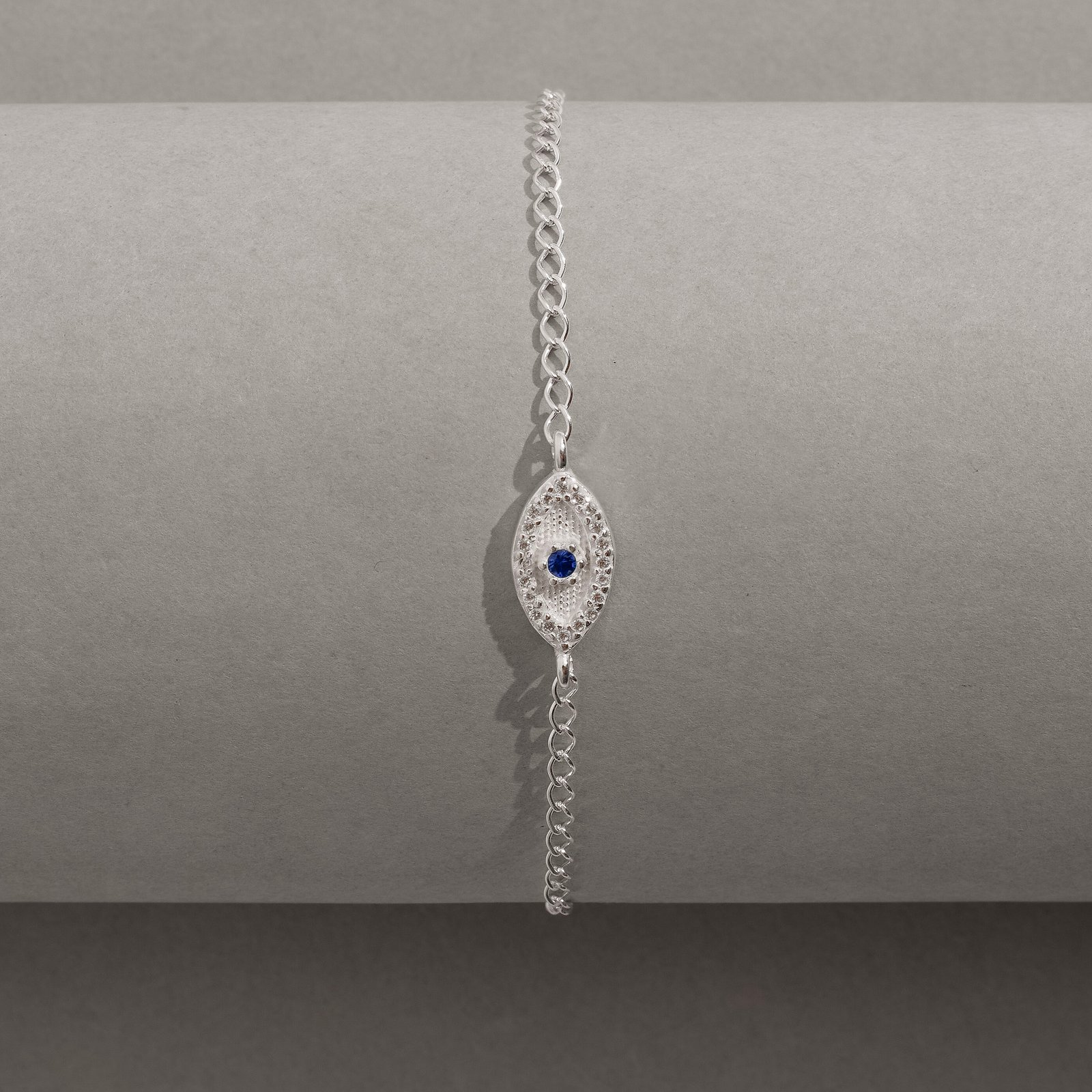 Pulseira entremeio olho cravejado detalhe zircônia azul 12mm