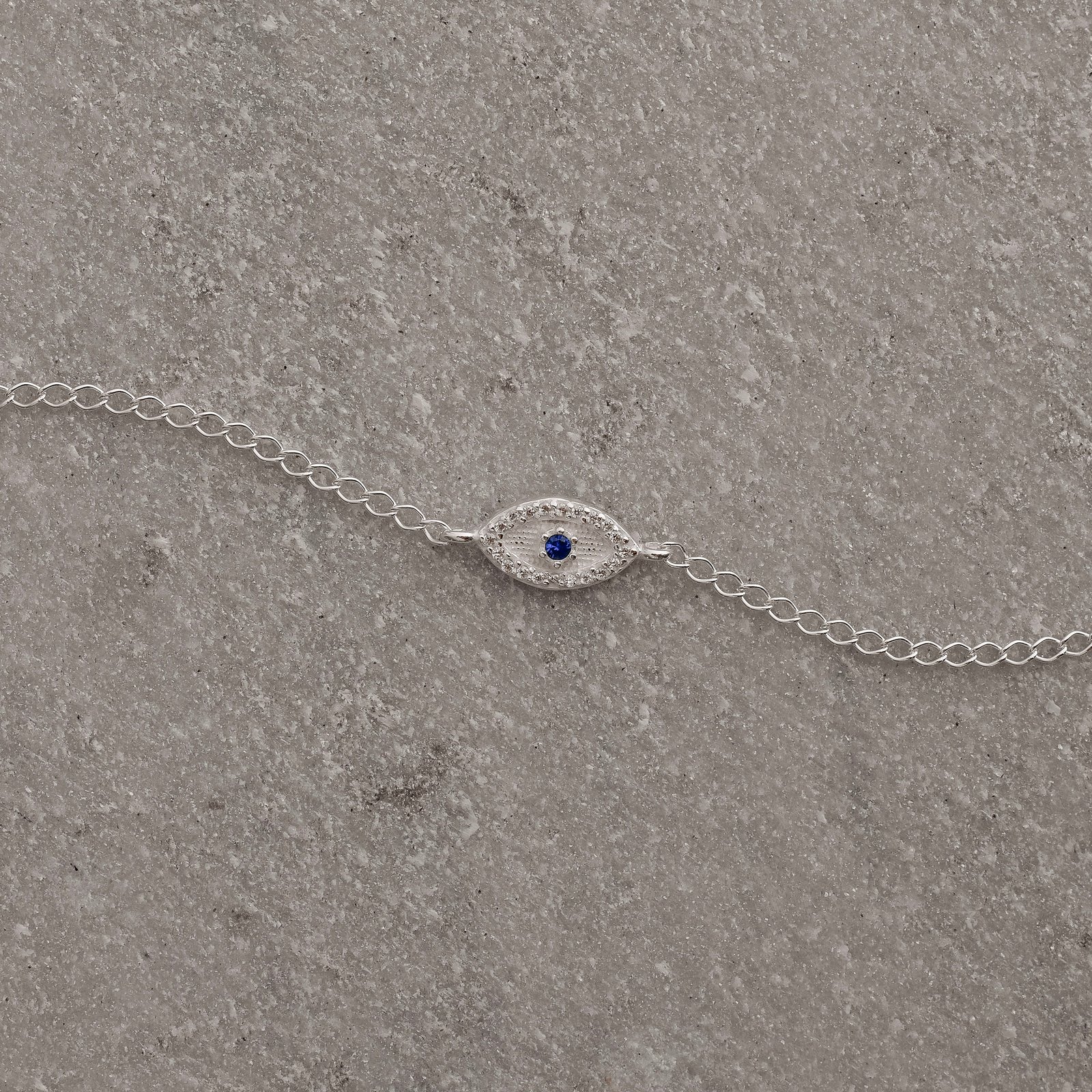 Pulseira entremeio olho cravejado detalhe zircônia azul 12mm