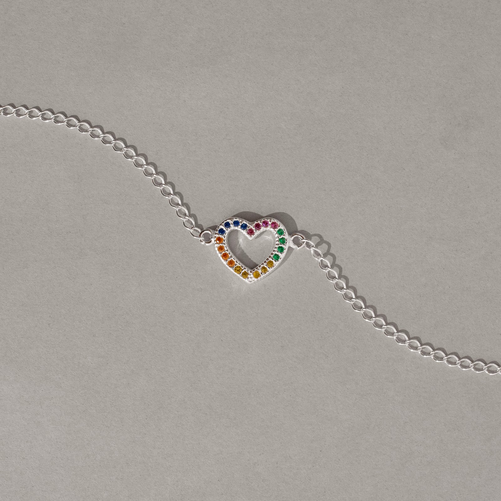 Pulseira entremeio coração vazado cravejado colorido 13mm