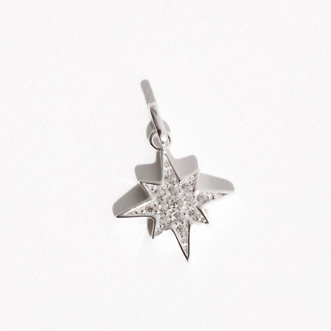 Pingente estrela 8 pontas cravejada 15mm