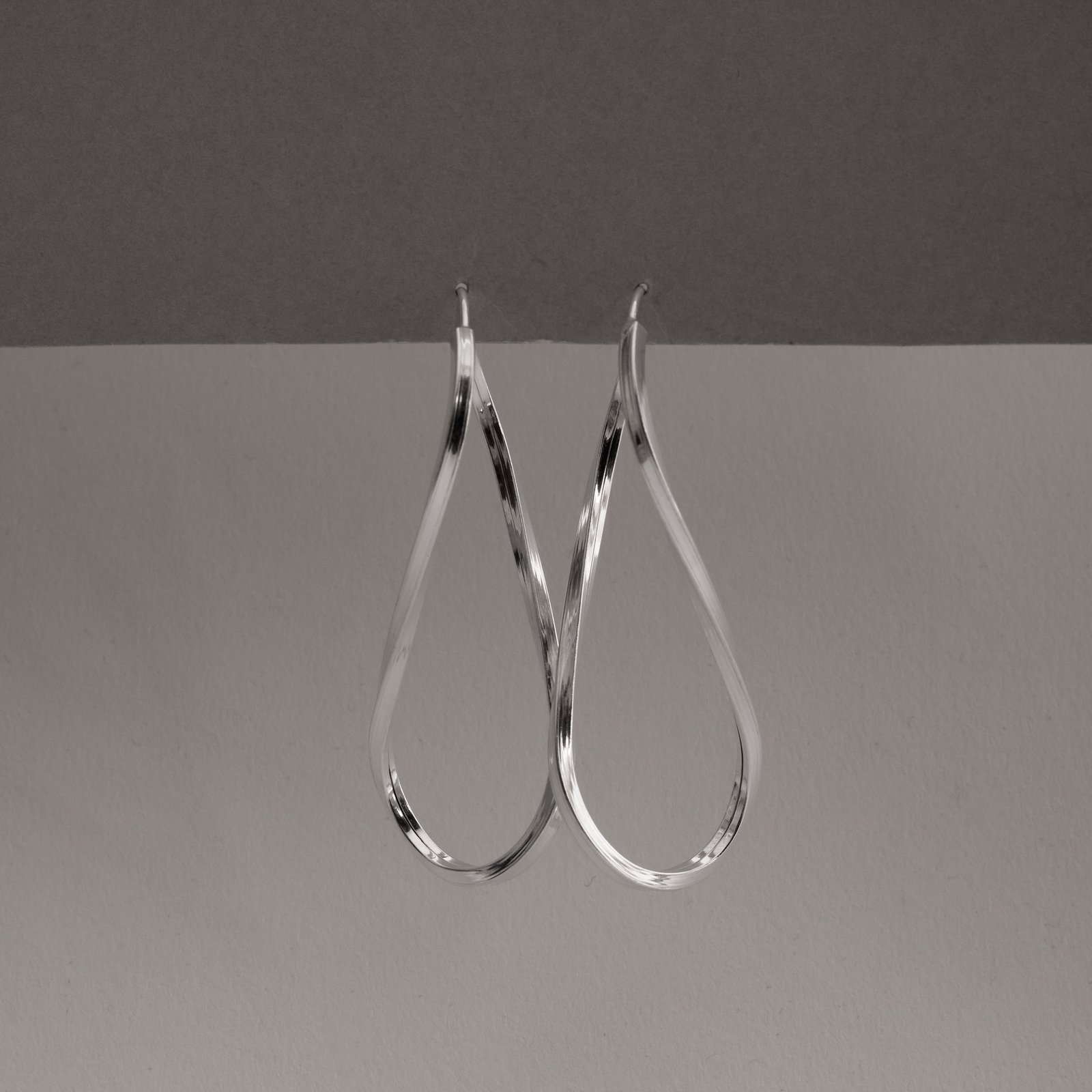 Argola infinito 50mm fio quadrado