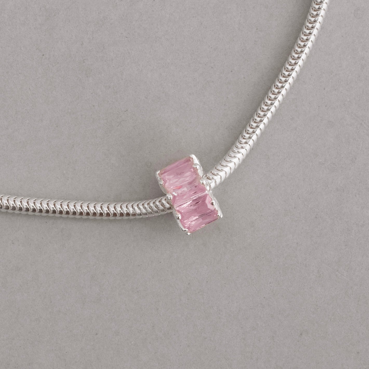 Berloque separador zircônias retangulares rosa 9mm