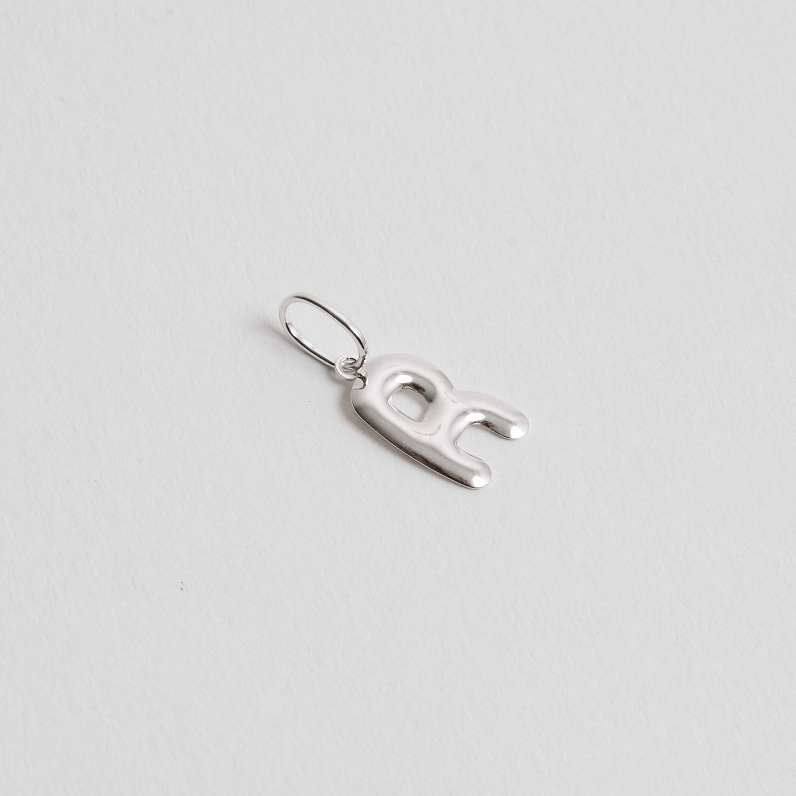 Pingente letra R 15mm