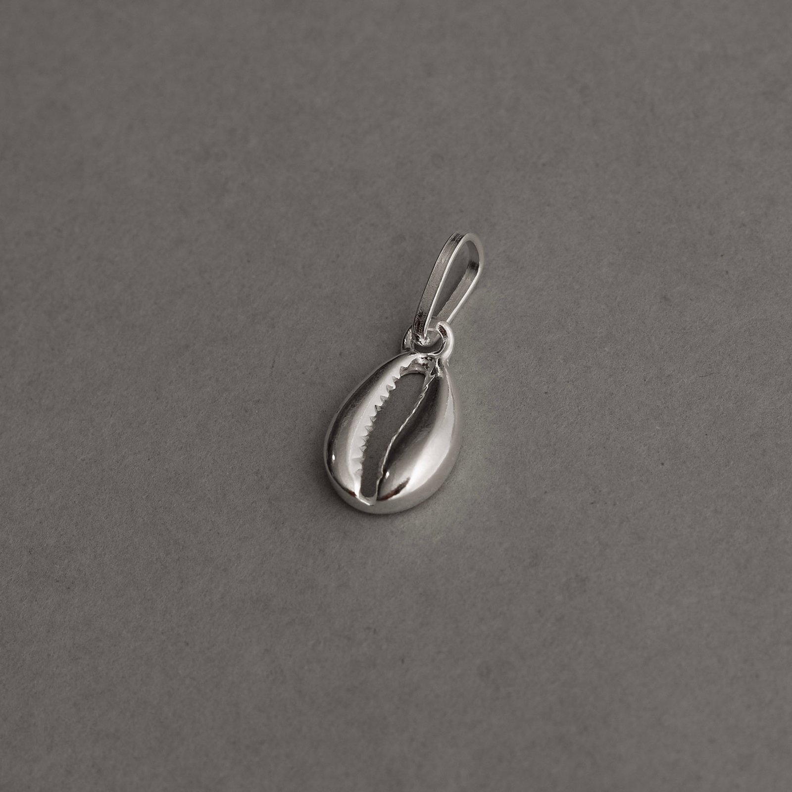 Pingente búzios 12mm