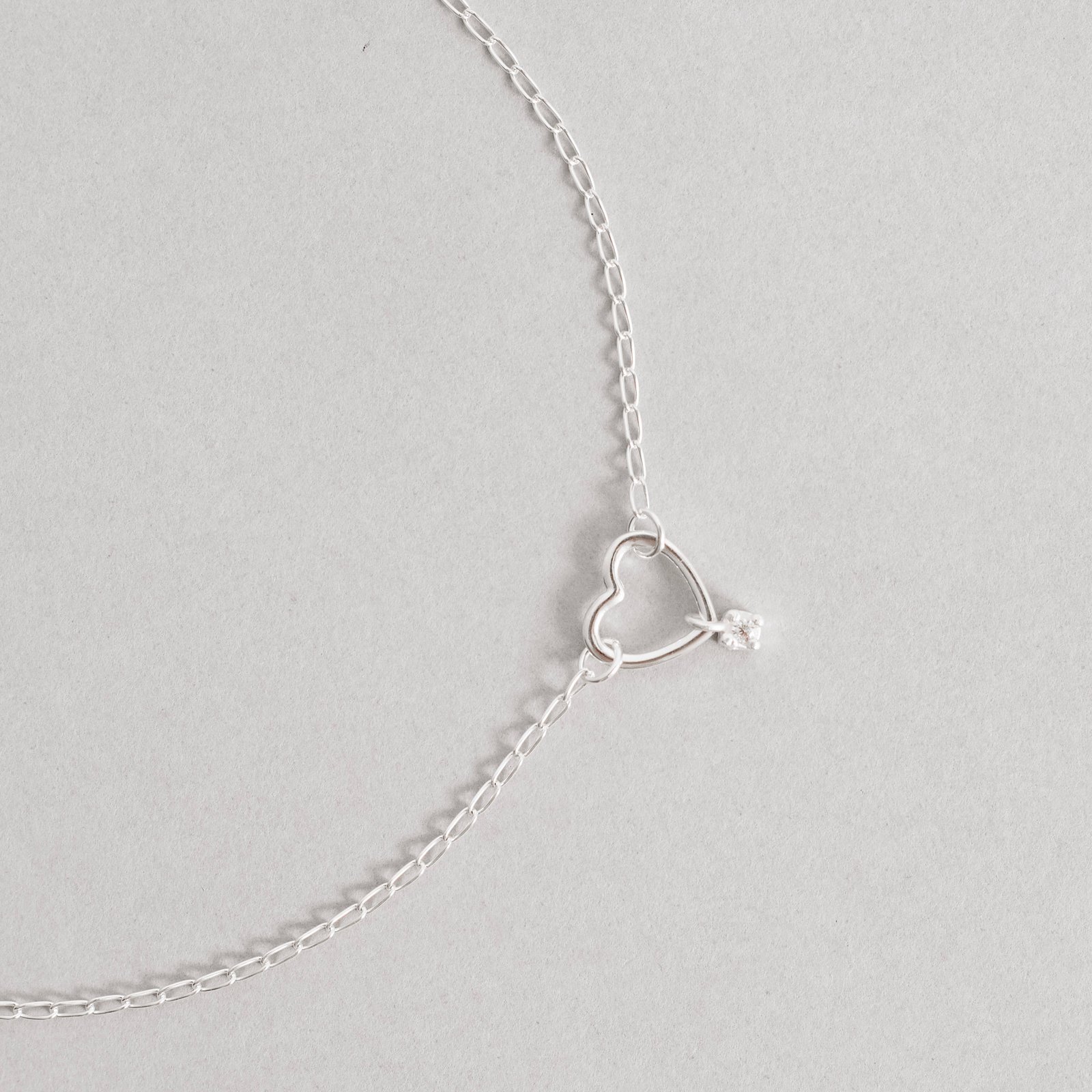 Pulseira entremeio coração vazado pingente mini zircônia
