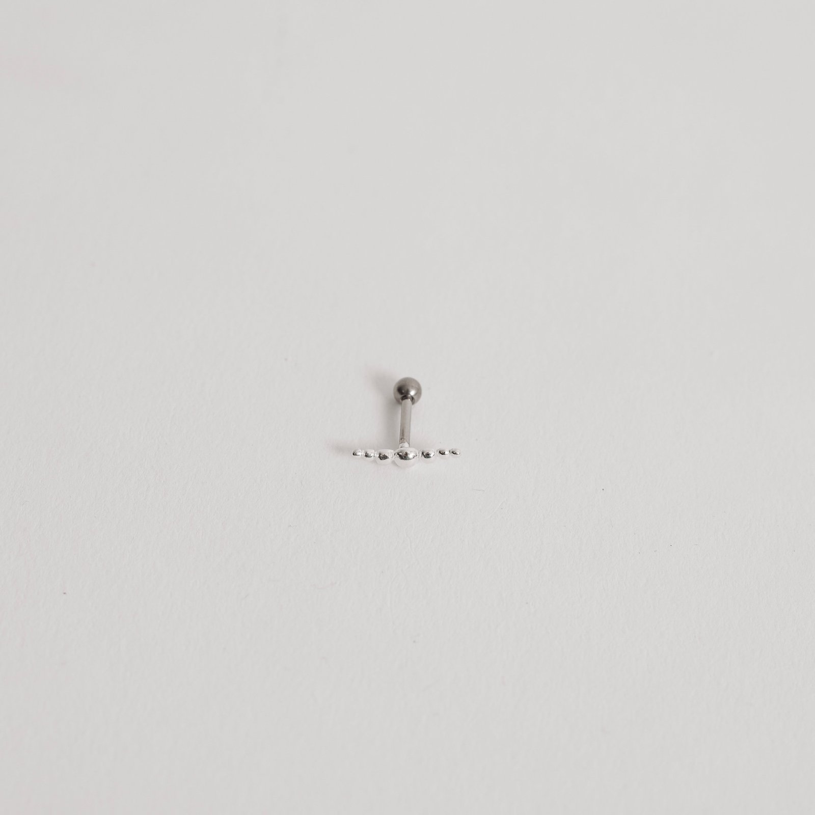 Piercing haste bolinhas 11mm