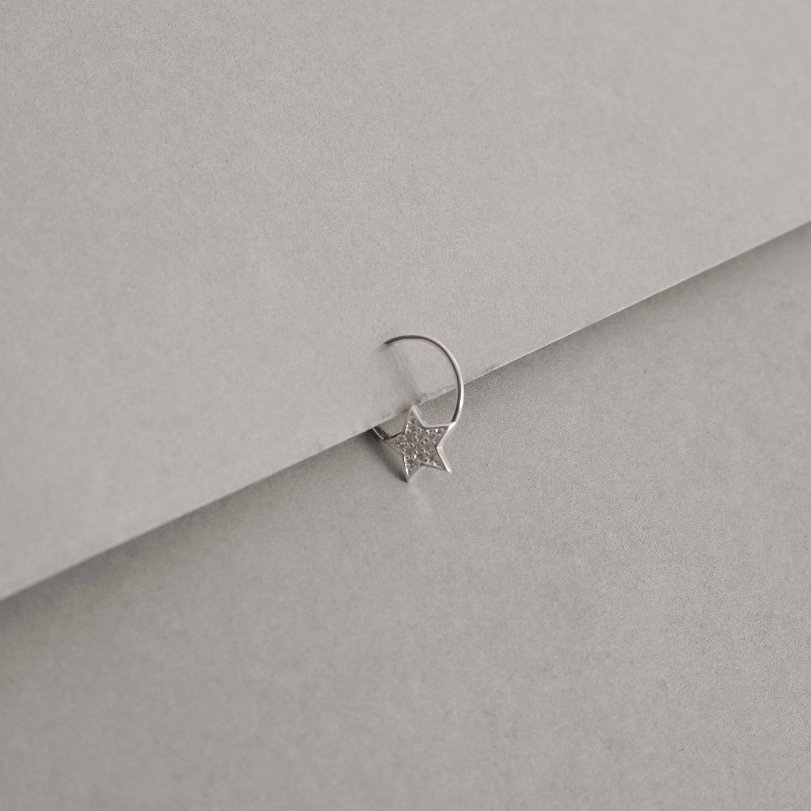 Piercing argola com estrela cravejada 11mm