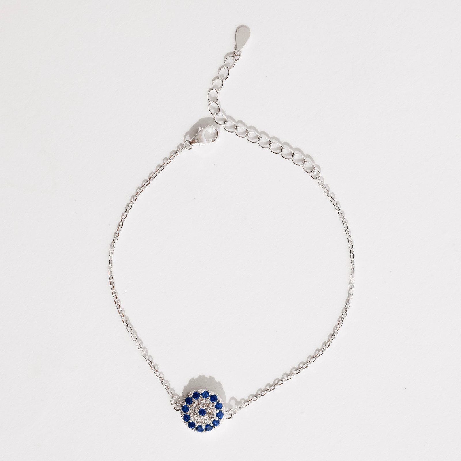 Pulseira entremeio círculo cravejado cristal e azul 10mm