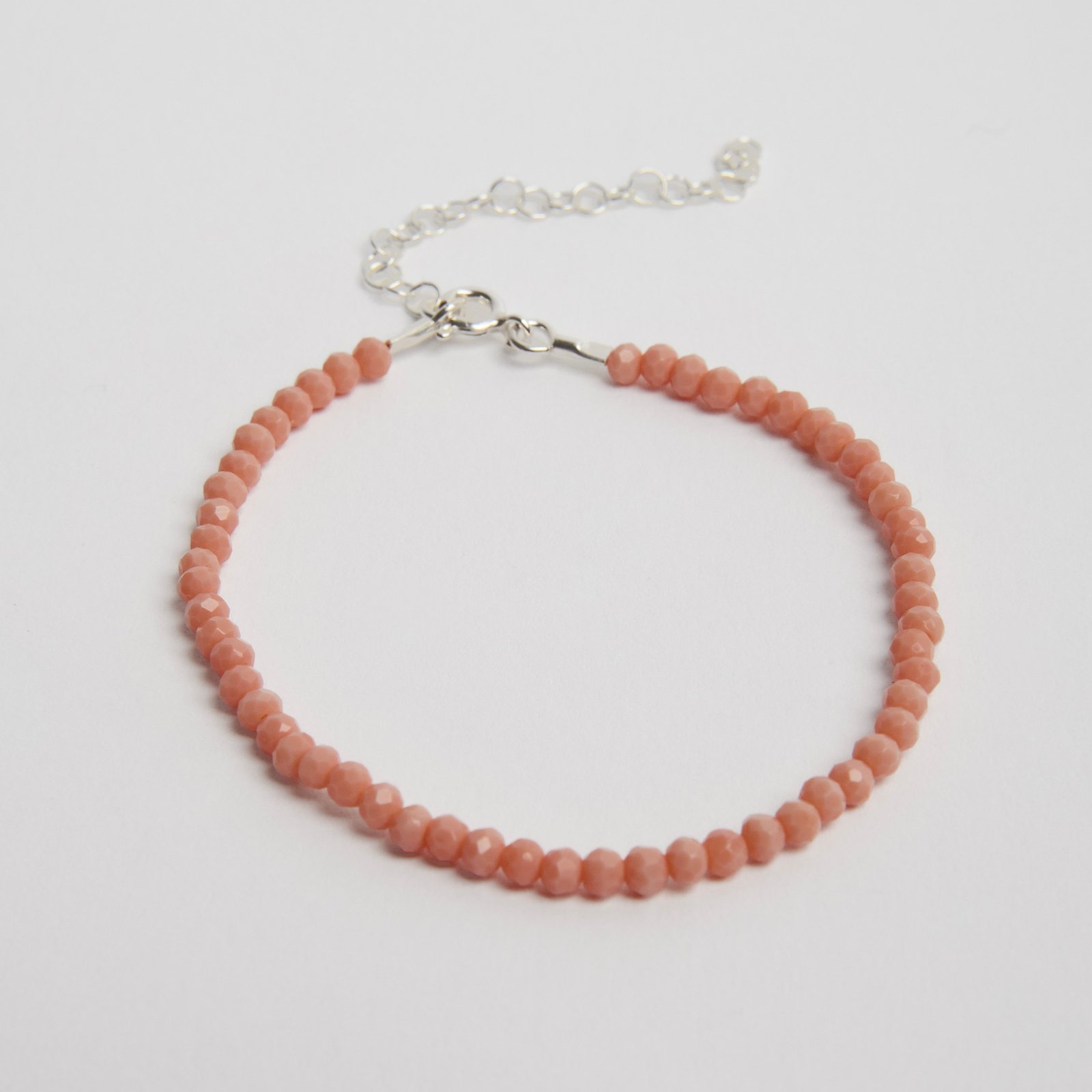 Pulseira cristal salmão fosco claro 3mm 16cm com alongadora