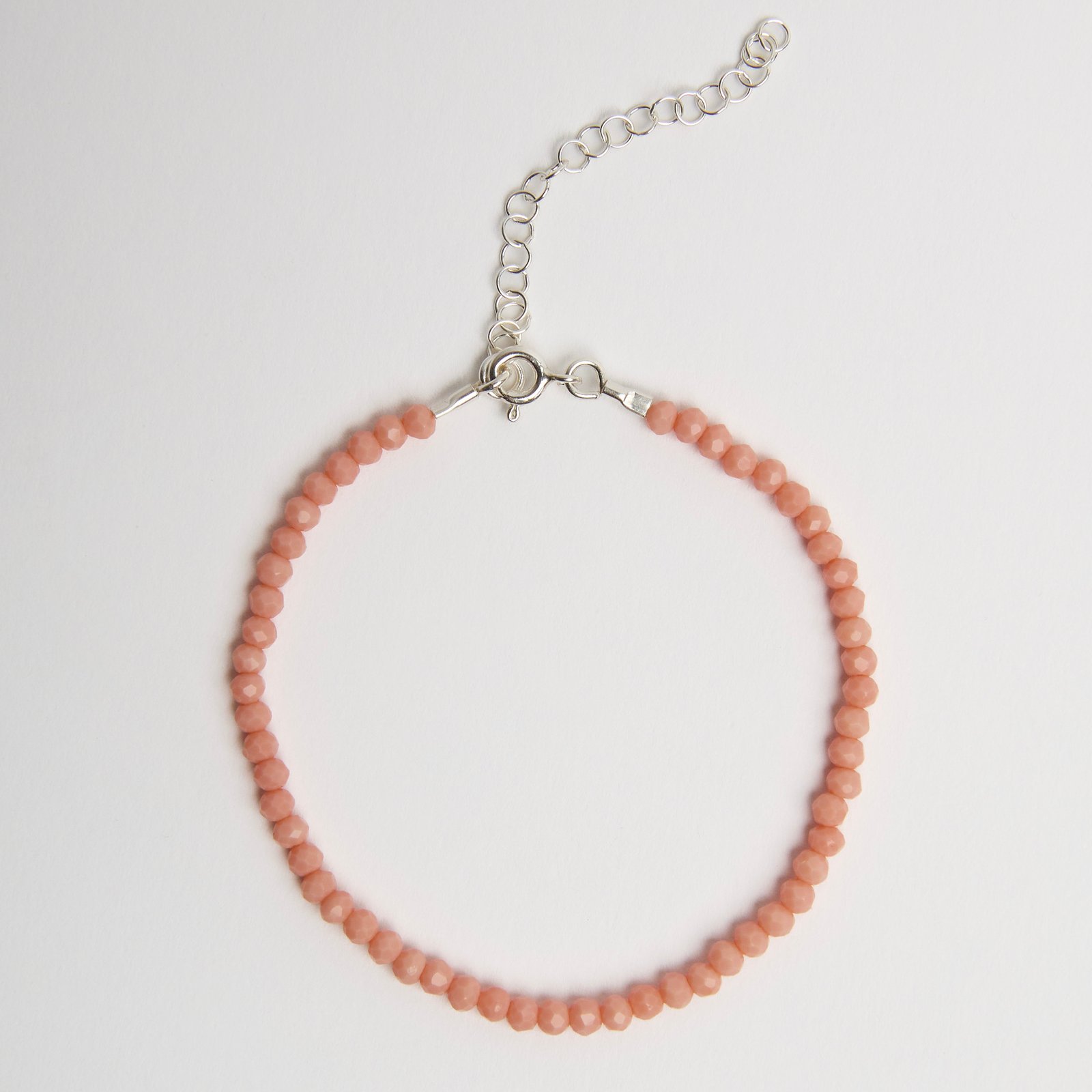 Pulseira cristal salmão fosco claro 3mm 16cm com alongadora