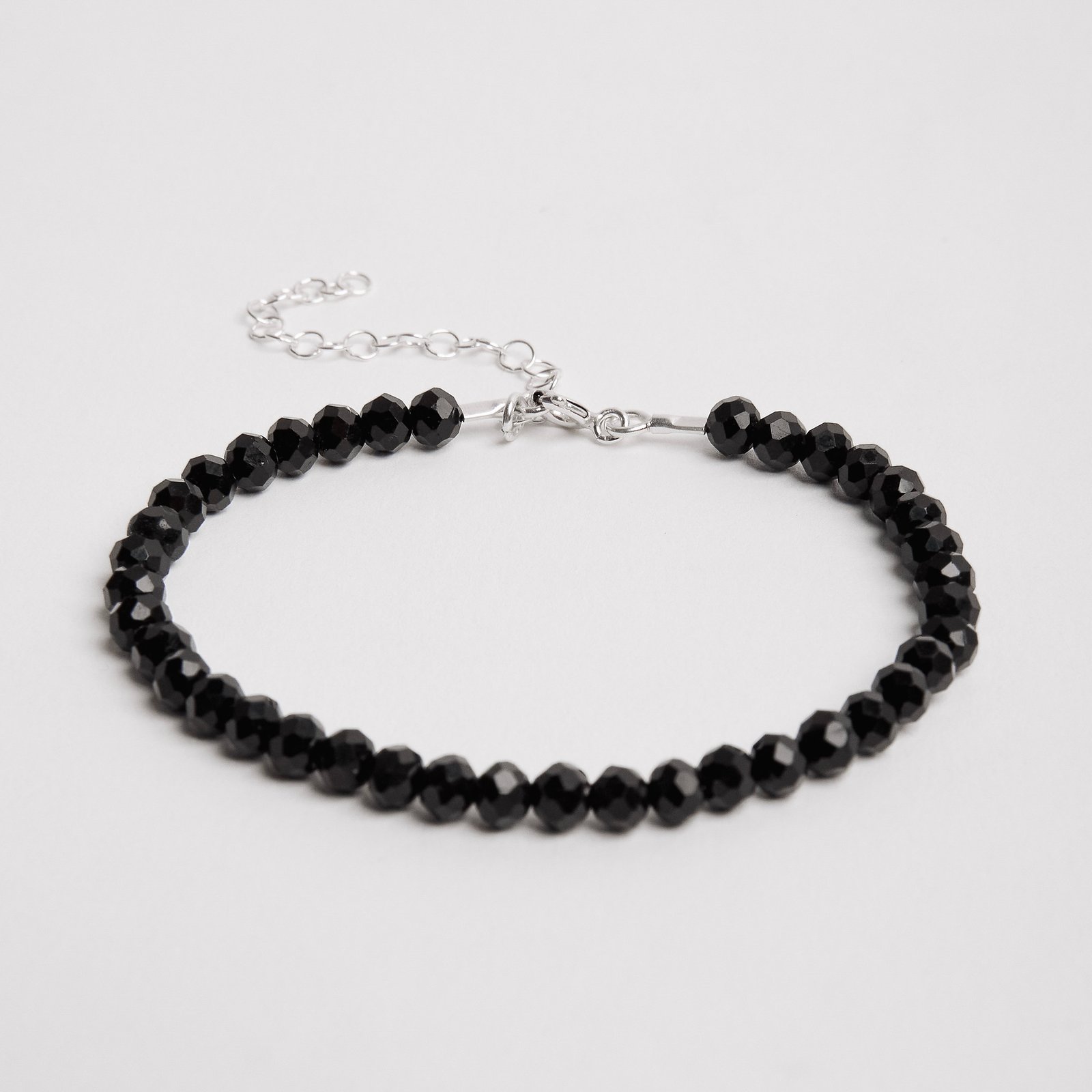 Pulseira cristal preto 4mm 16cm com alongadora