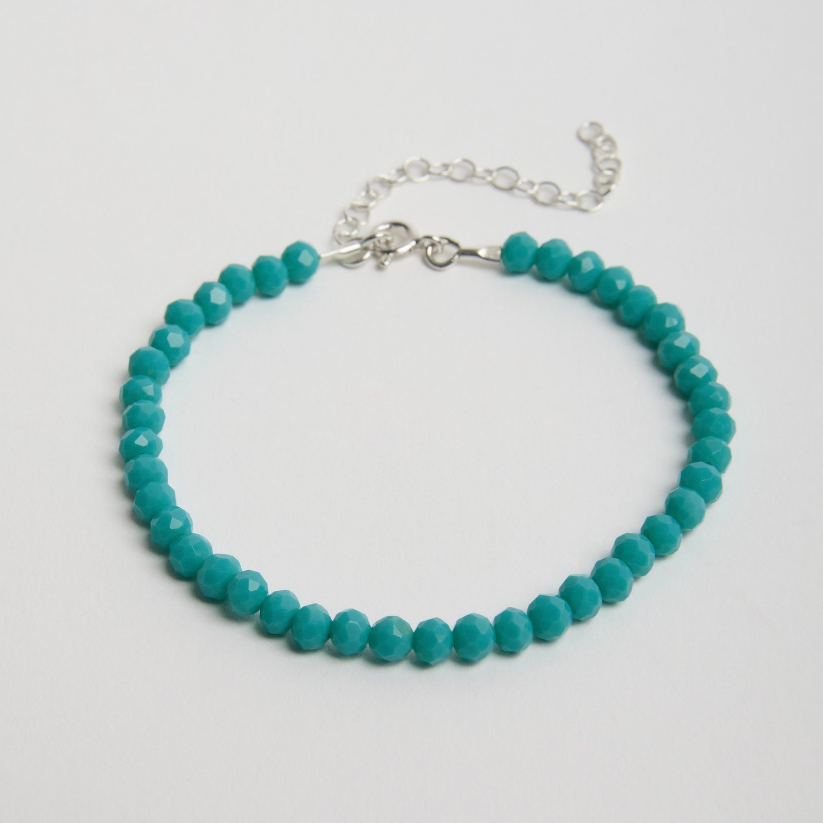 Pulseira cristal turquesa 4mm 16cm com alongadora