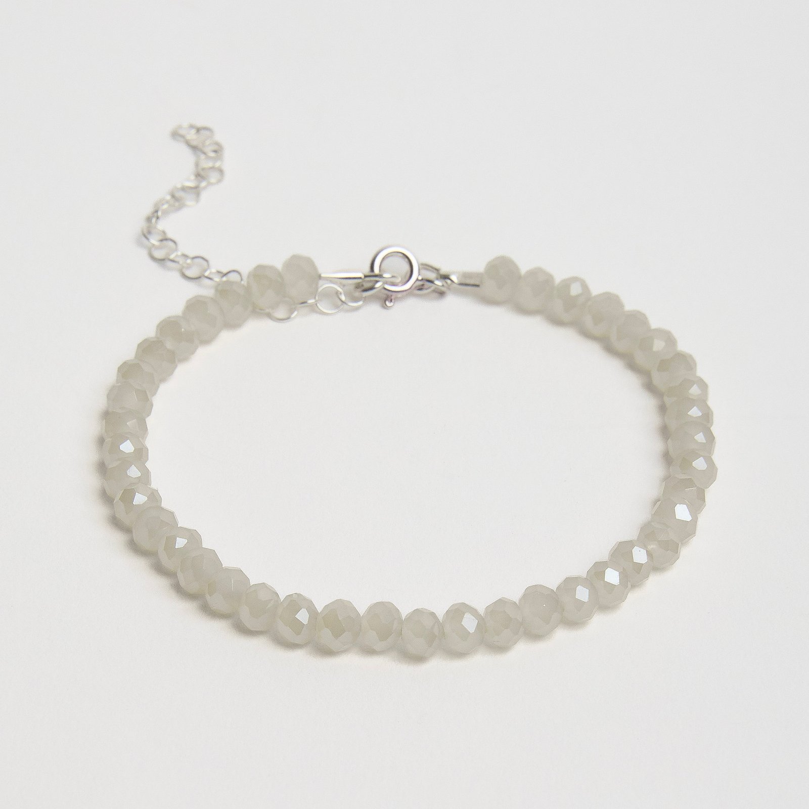 Pulseira cristal bege irisado 4mm 16cm com alongadora