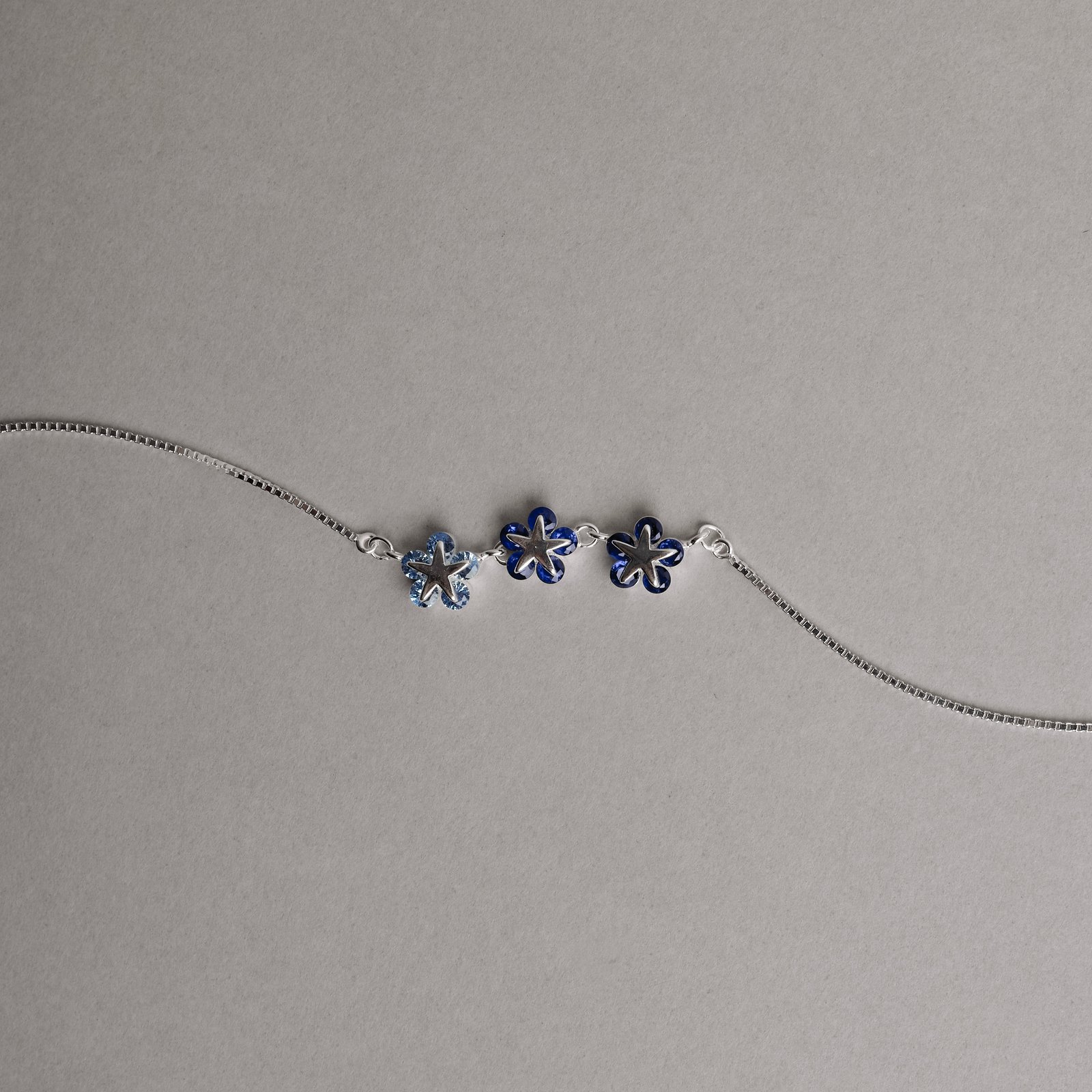 Colar entremeio estrelas cravejadas azul 25mm v15 40+5cm