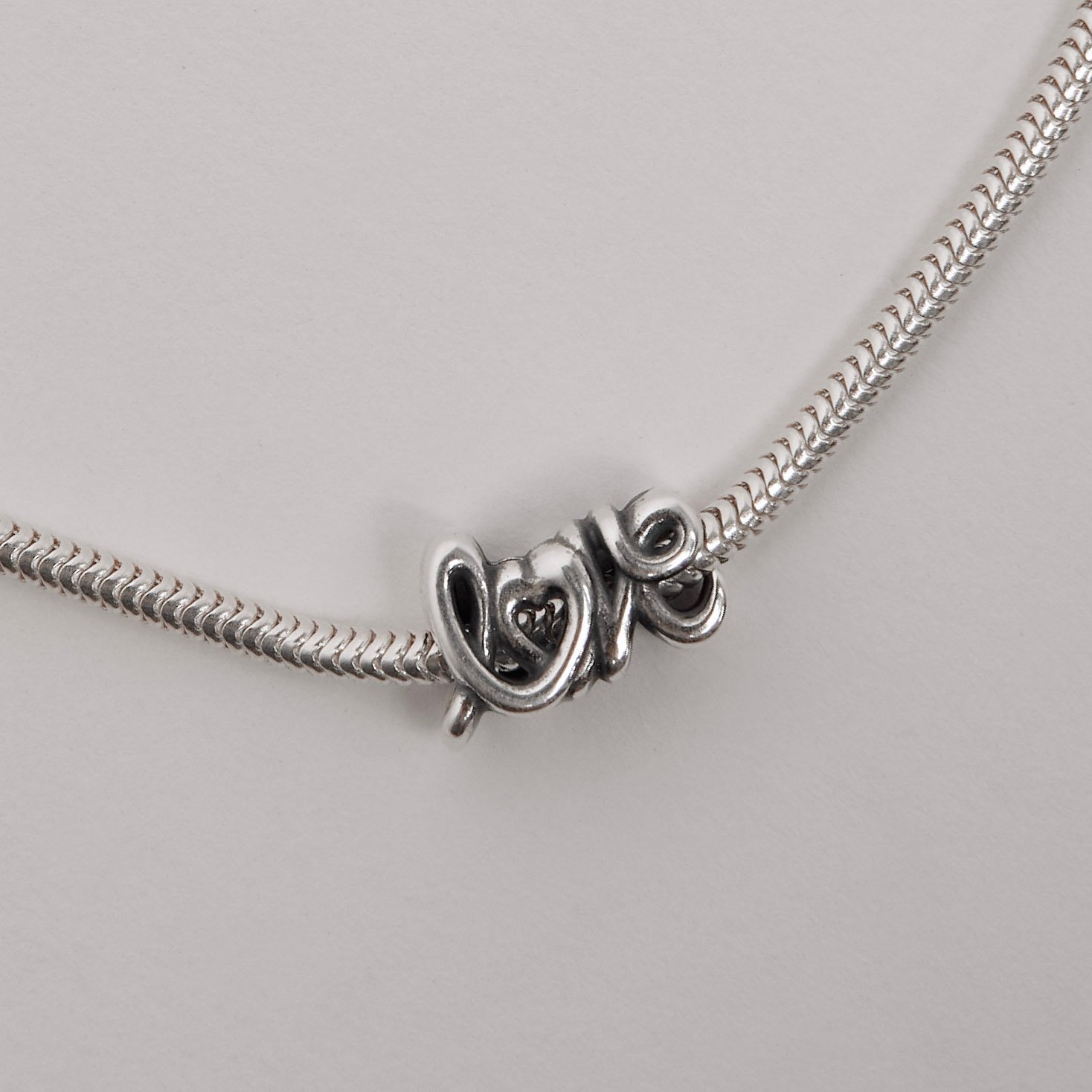 Berloque separador love 14mm envelhecido