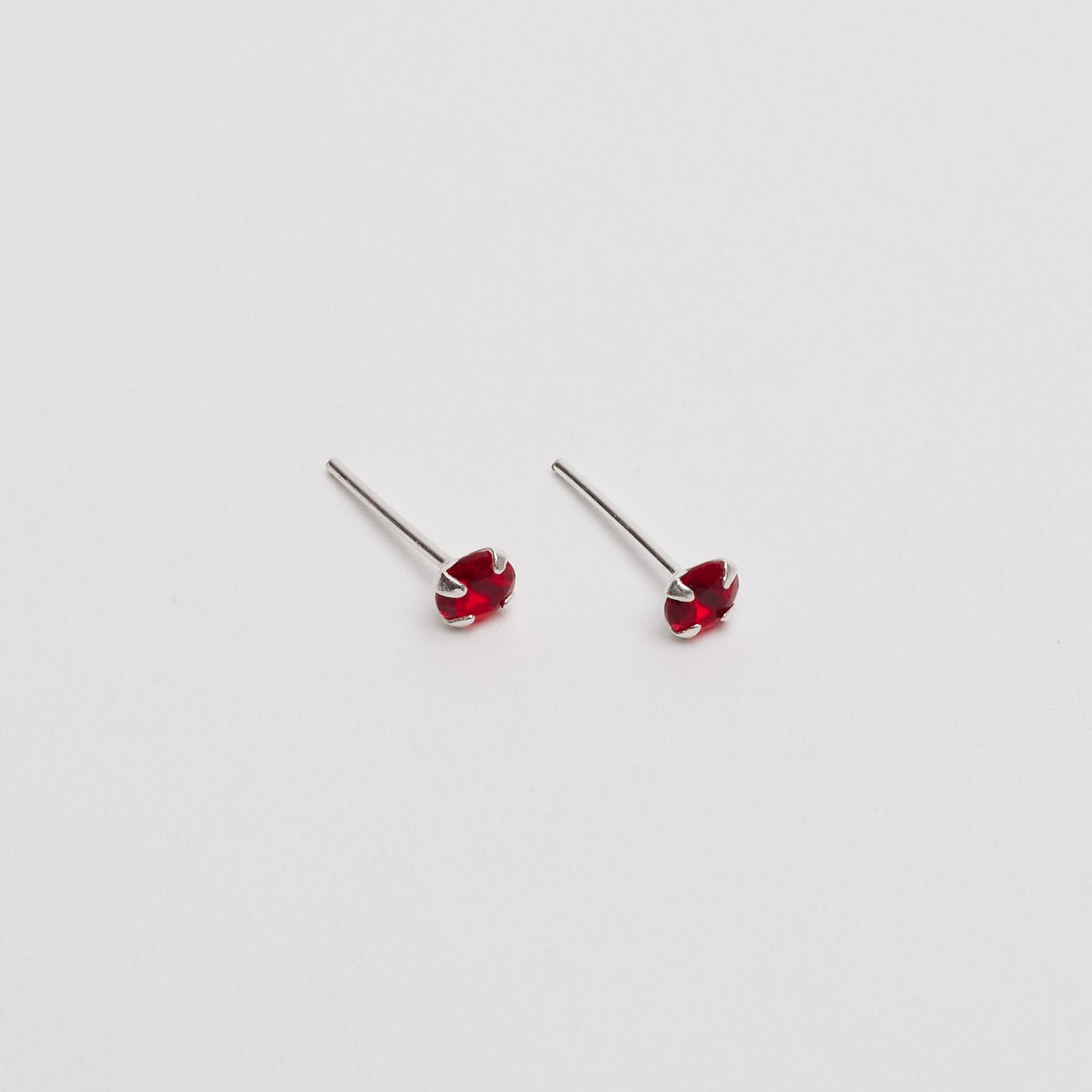 Brinco zircônia redonda rubi 4mm