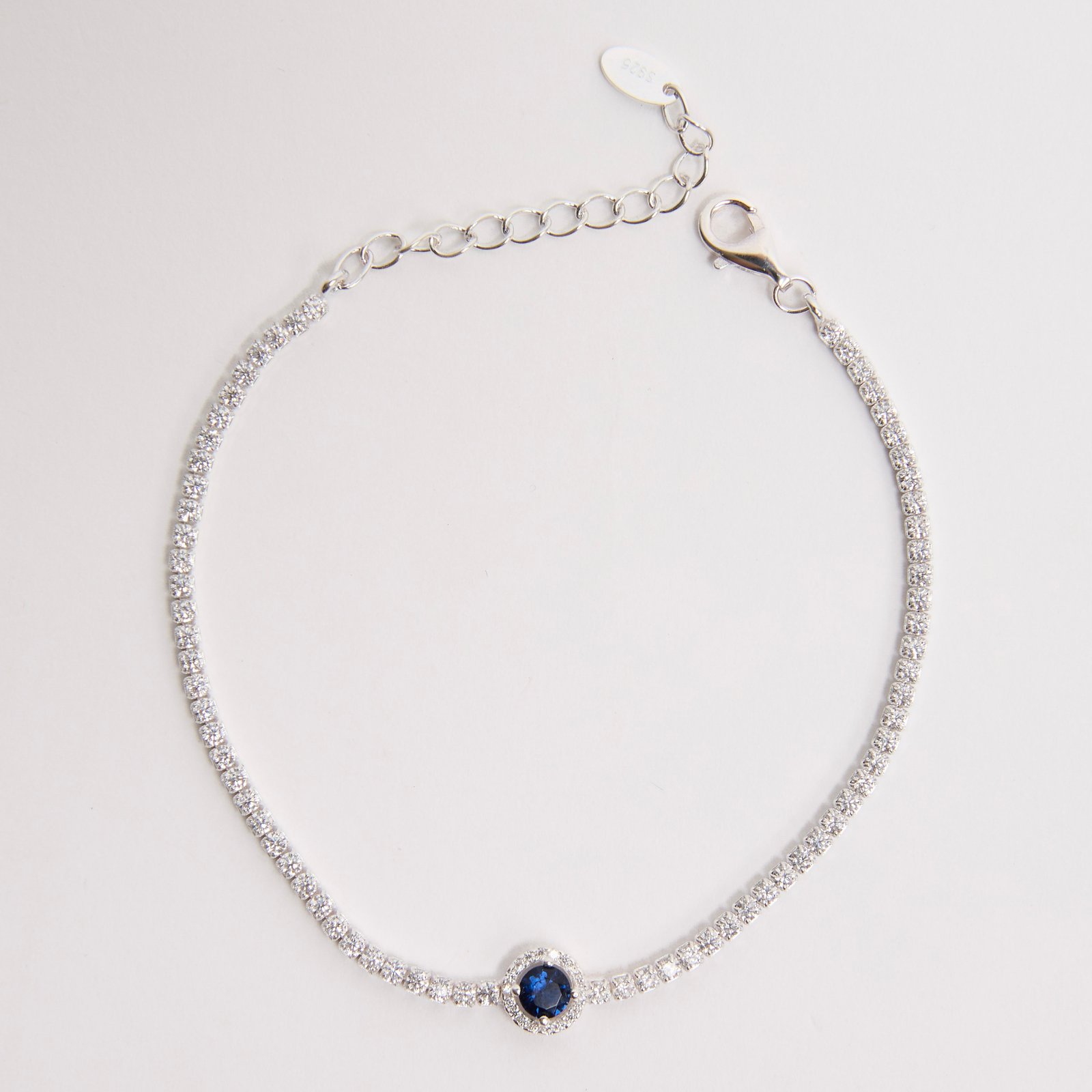 Pulseira Riviera 2mm com círculo vazado cravejado safira 16+4cm