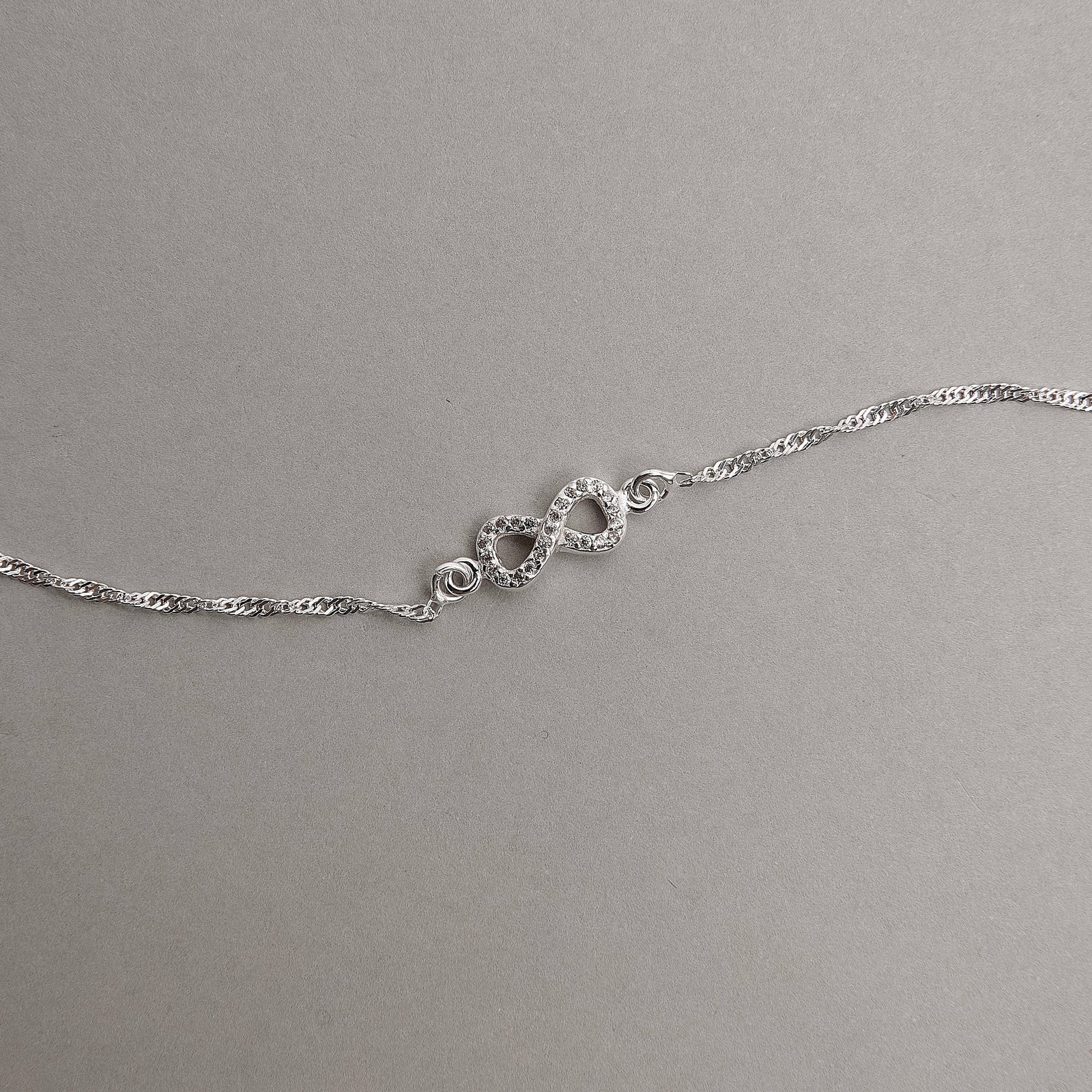 Pulseira entremeio infinito cravejado 12mm corrente singapura 19+3cm