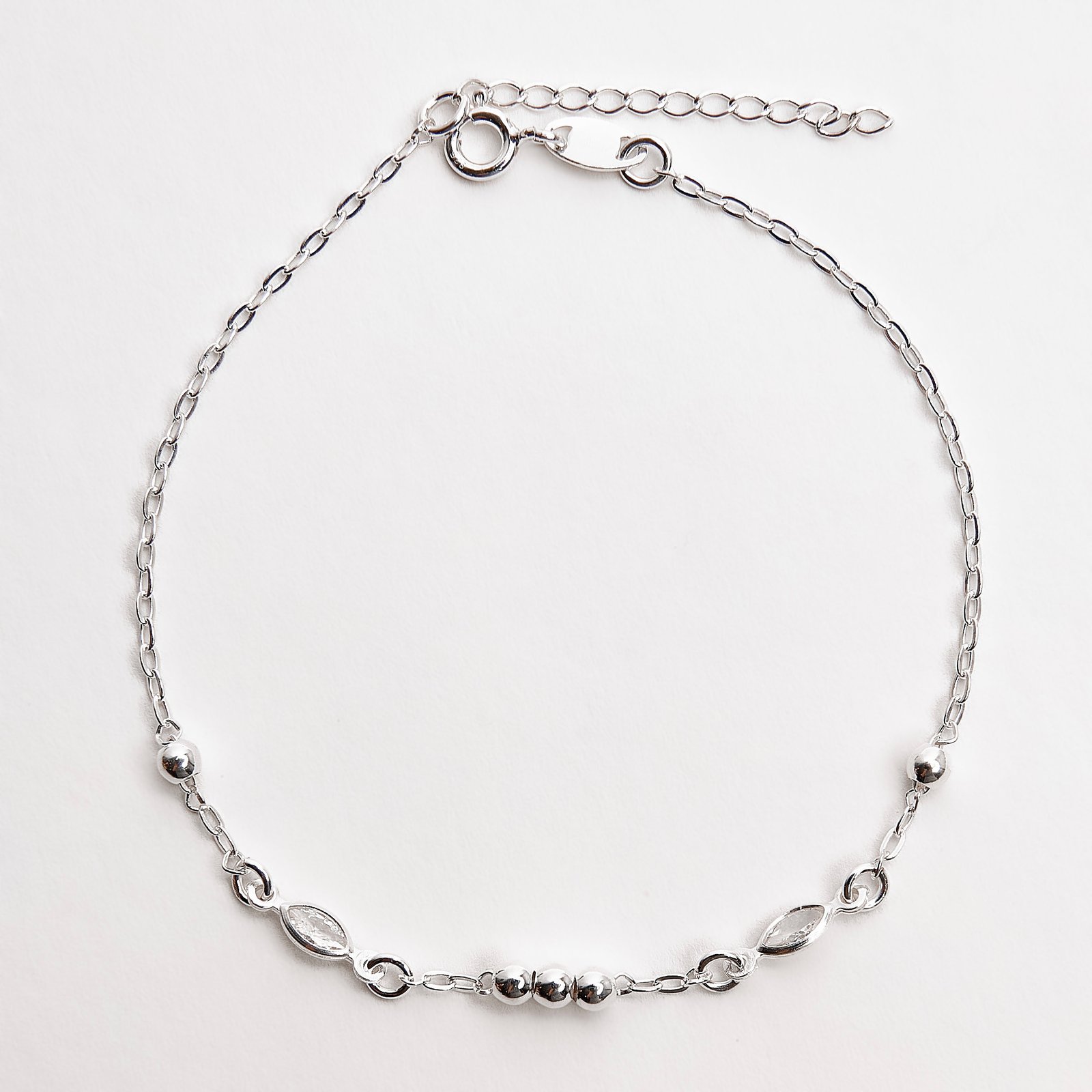 Imagem Pulseira entremeios bolas e zircônias navete 18+3cm