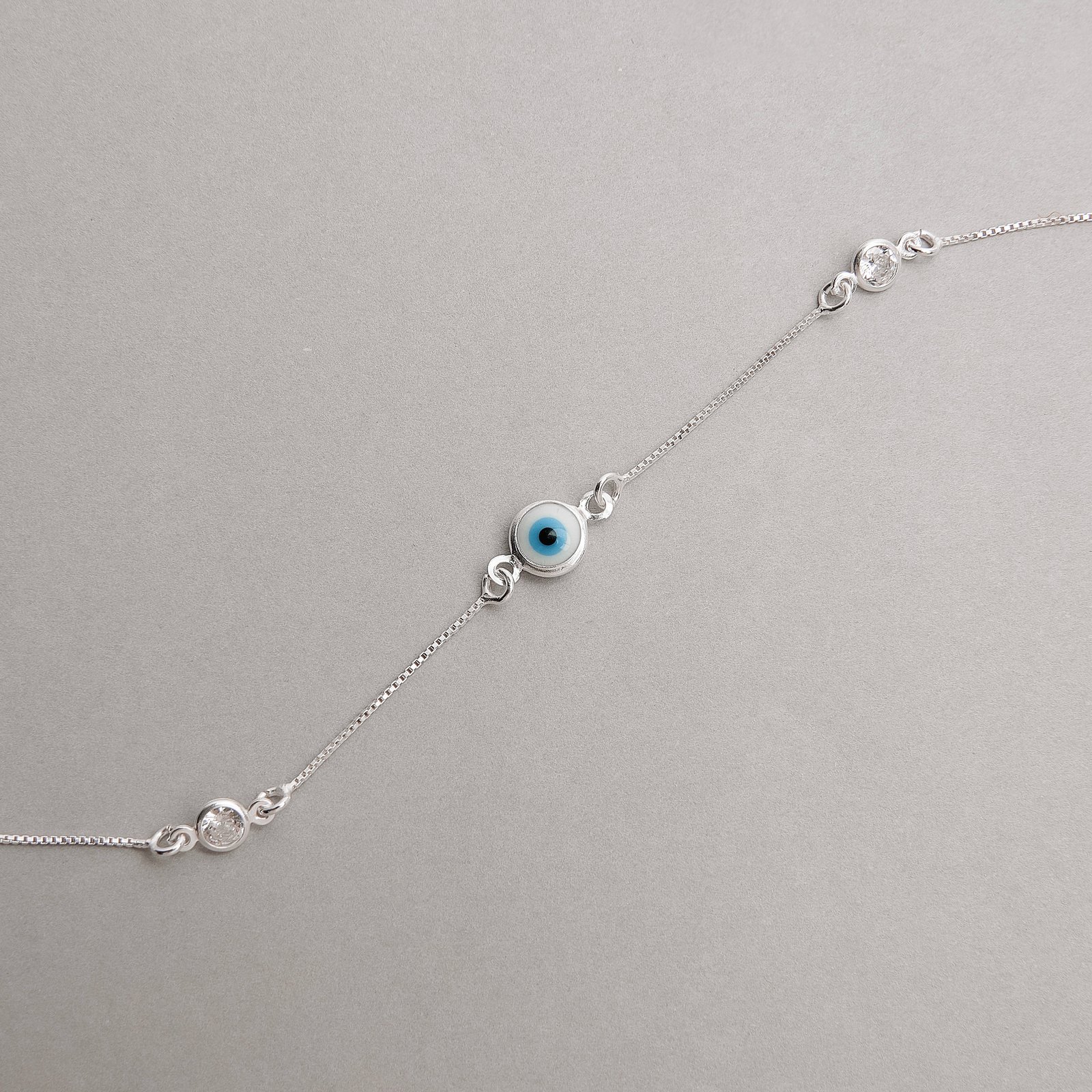 Pulseira entremeio olho grego e zircônias 5mm 19+3cm