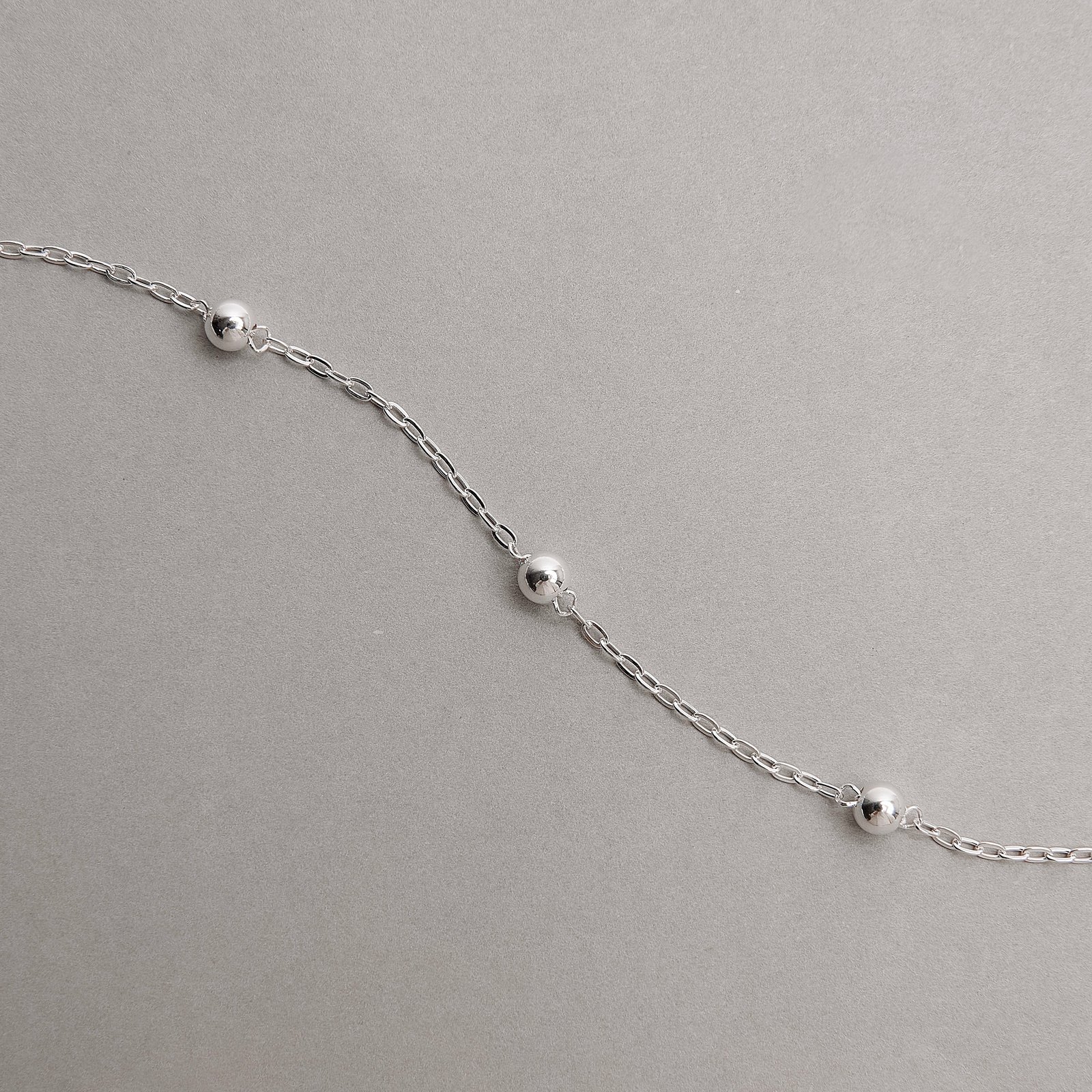 Pulseira entremeios 5 bolas 4mm 18+3cm