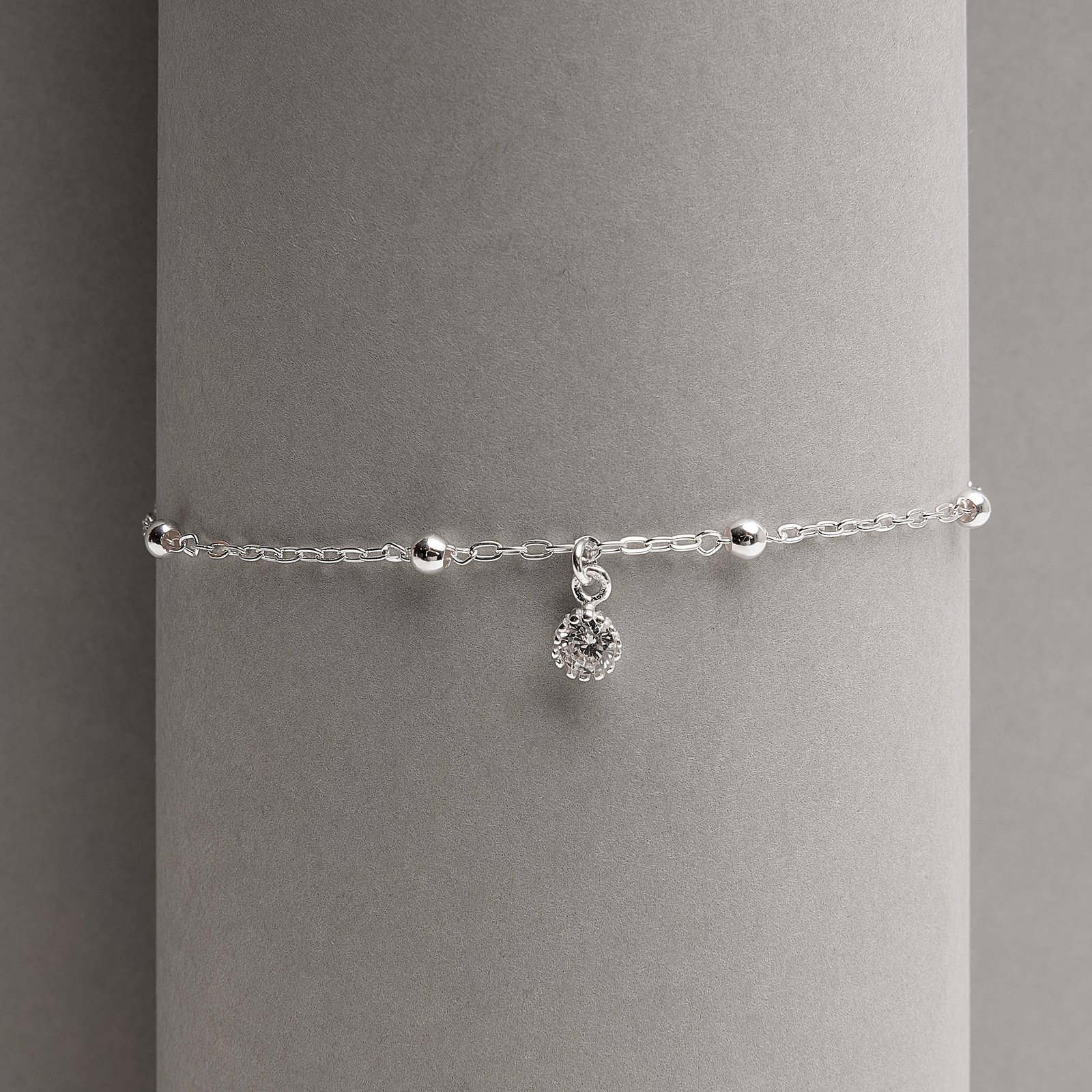 Pulseira entremeios bolas com pingente zircônia 5mm 18+3cm