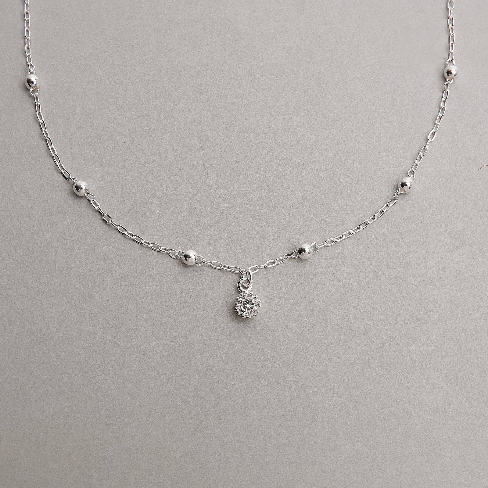 Pulseira entremeios bolas com pingente zircônia 5mm 18+3cm