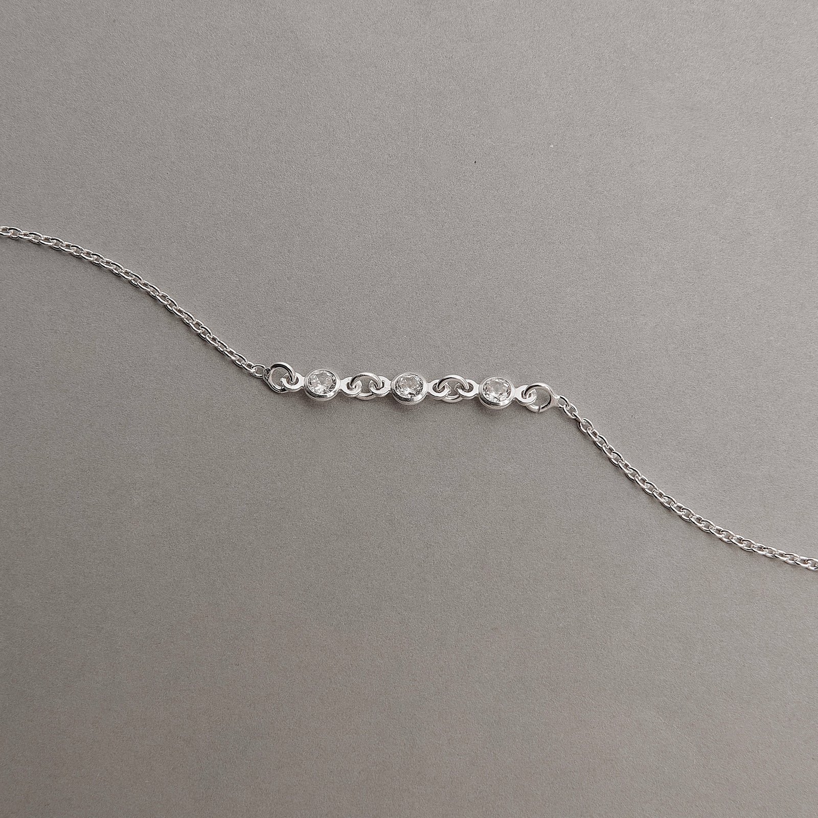 Pulseira infantil entremeio zircônias 4mm 14cm com alongadora