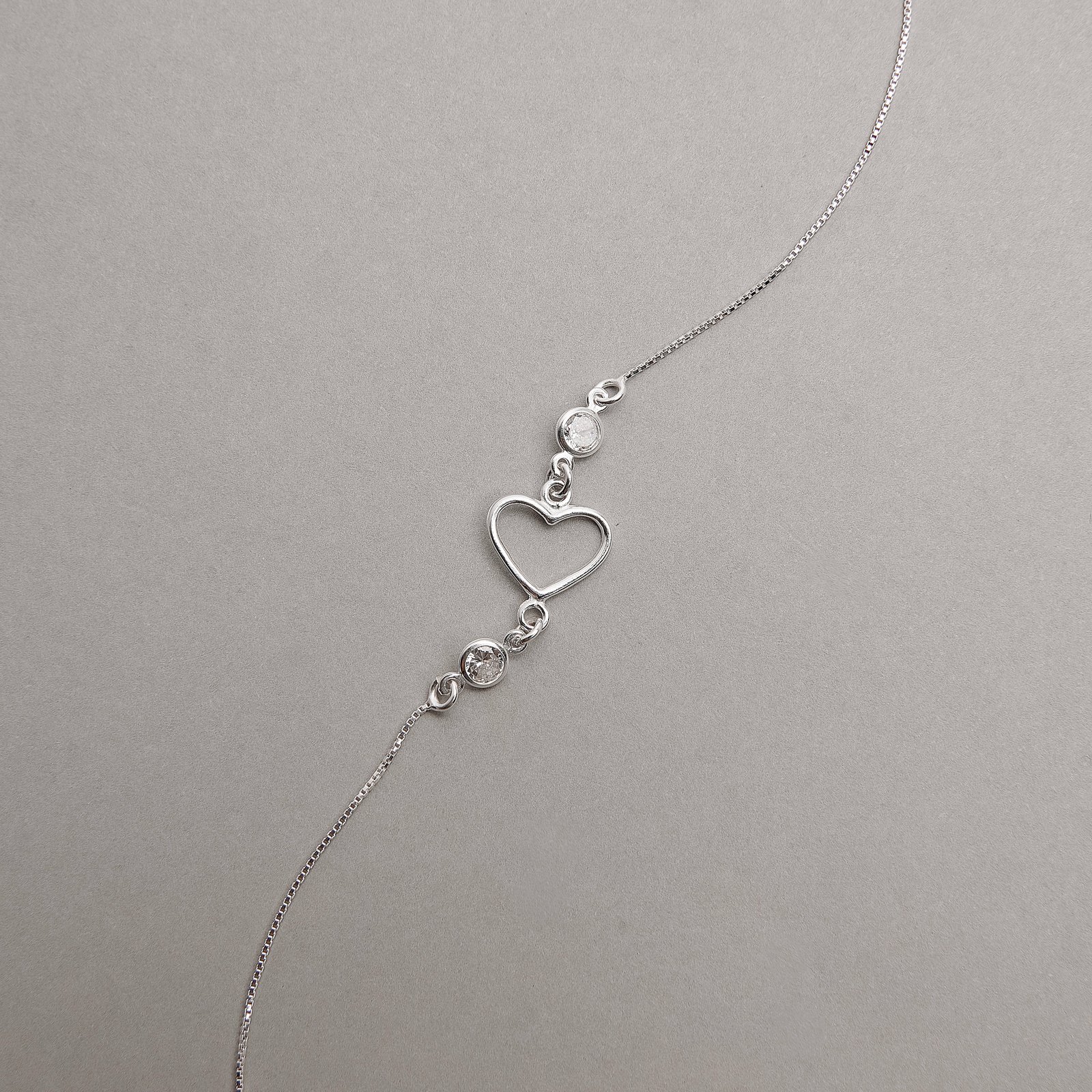 Pulseira entremeio coração vazado com zircônias 5mm 19+3cm