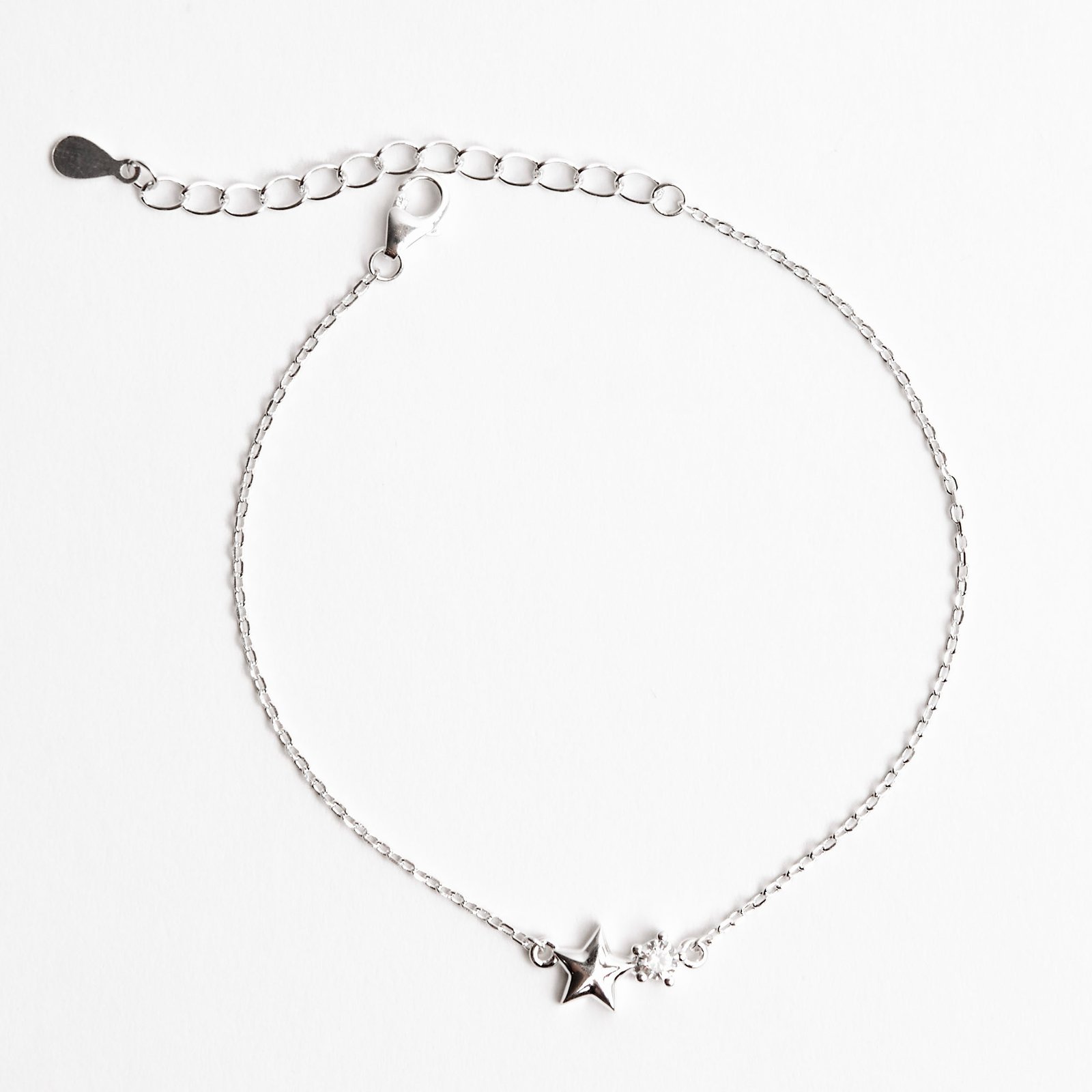 Imagem Pulseira entremeio estrela e zircônia redonda 16+4cm