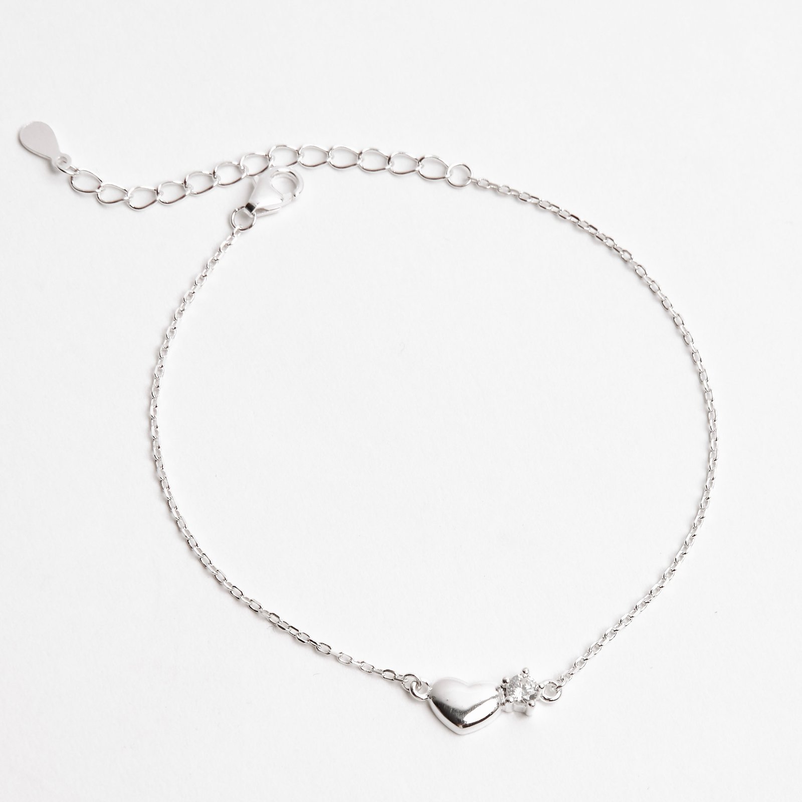Imagem Pulseira entremeio zircônias redonda e coração 3 e 4mm 16+4cm