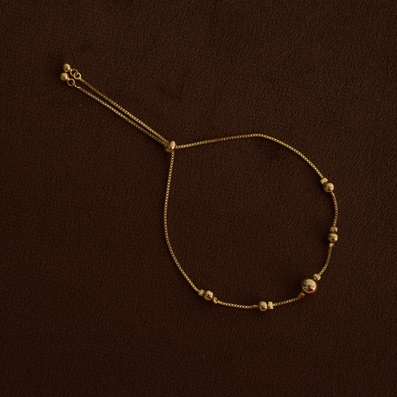 Pulseira entremeio bolas 4 e 6mm fecho regulável
