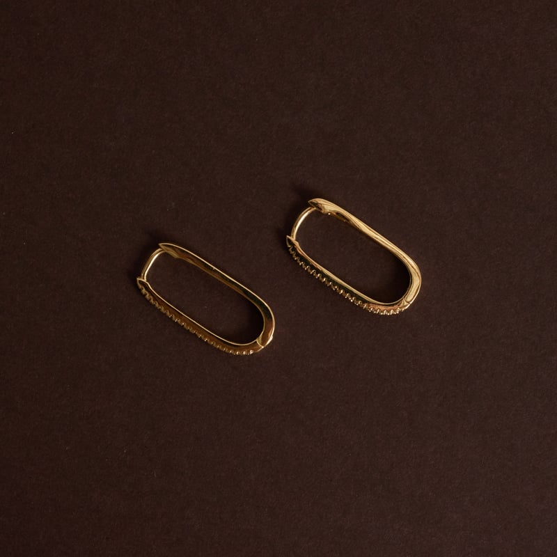 Argola click oval cravejada 23mm