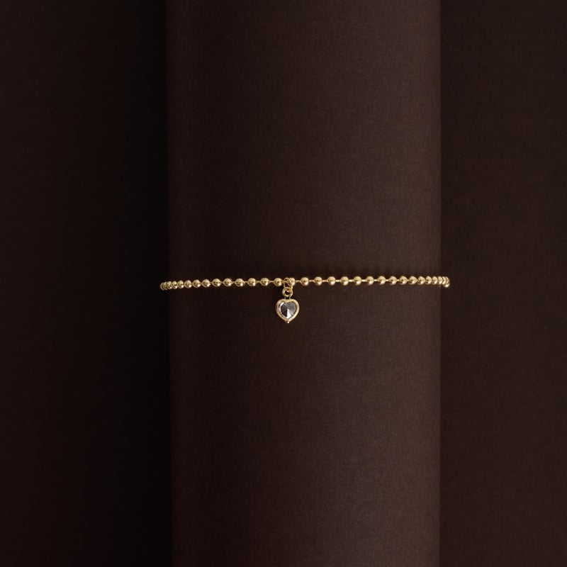 Pulseira entremeio bolas com pingente zircônia coração 5mm fecho regulável