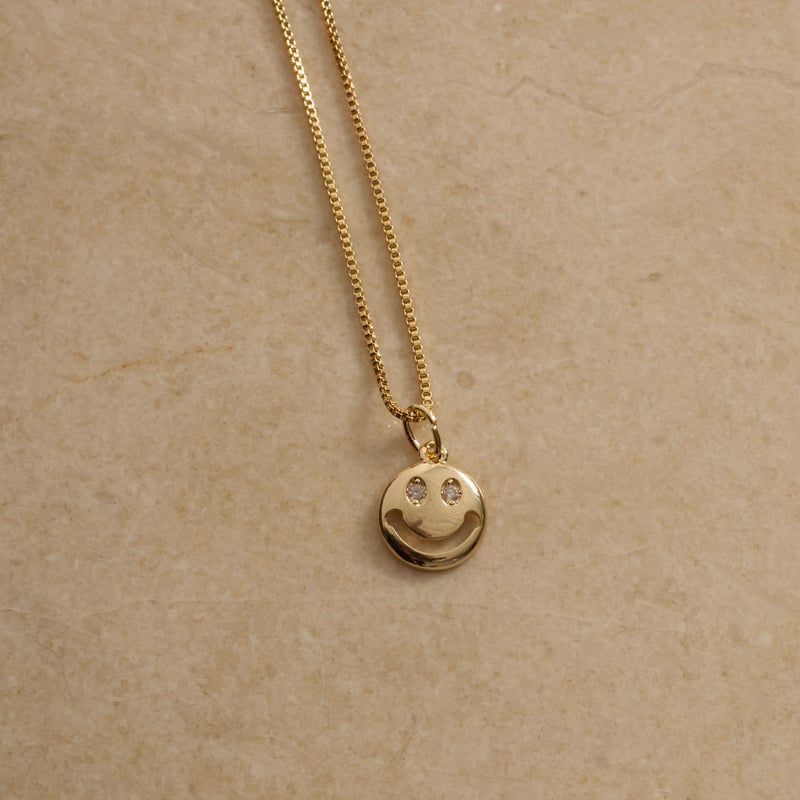 Colar pingente smile 10mm com zircônias 45cm com alongadora