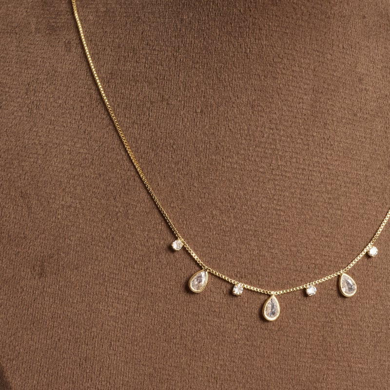 Colar entremeios zircônias redonda e gota 40cm com alongadora