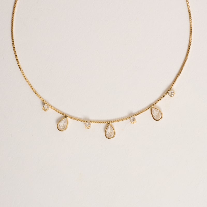 Colar entremeios zircônias redonda e gota 40cm com alongadora