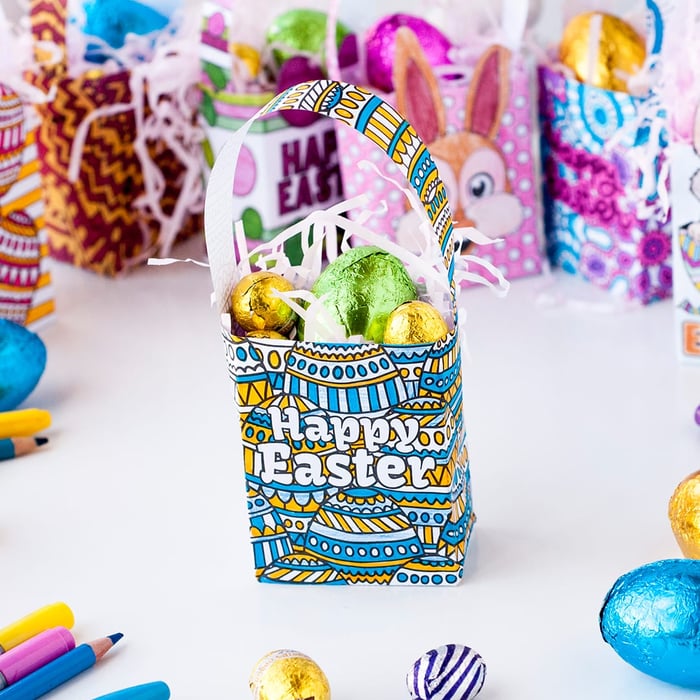 Aren't these cute? These mini Easter gift bags are easy to make, and there are 8 designs to choose from. Find more Easter printables, craft templates and coloring pages at https://sarahrenaeclark.com/shop/cat/seasonal/easter